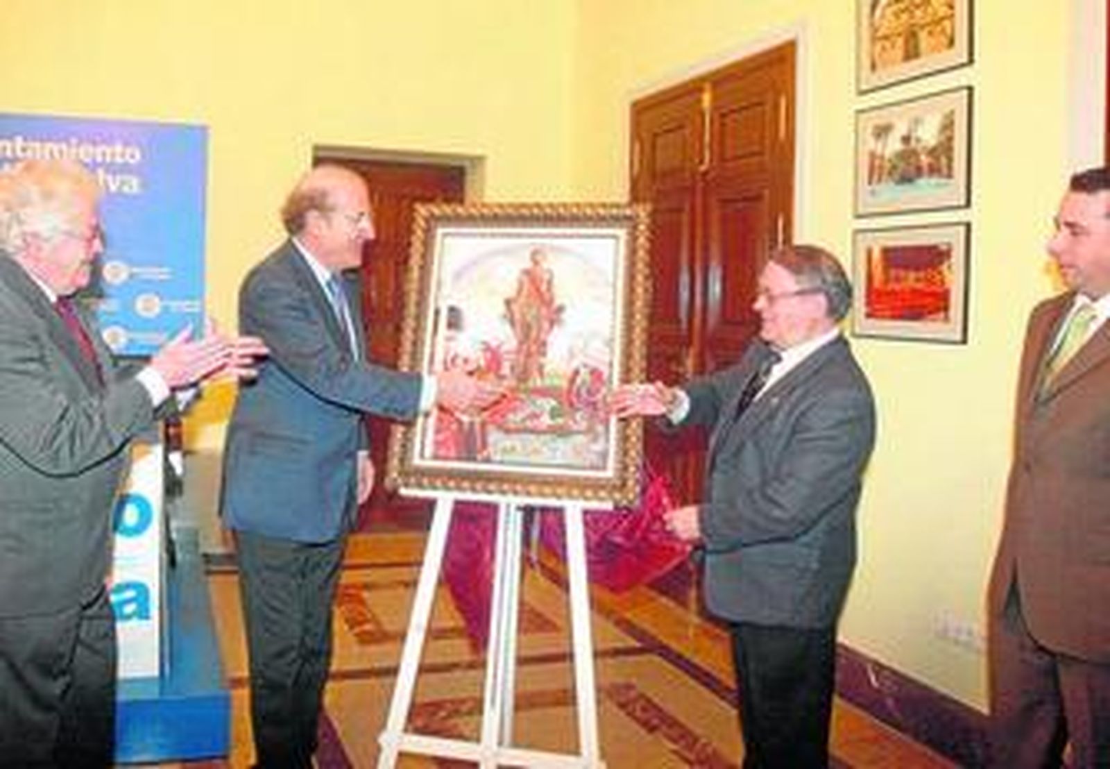 Juan José Domínguez, Pedro Rodríguez, Esteban Aparicio y Ángel Salazar, ante el cartel del Patrón.