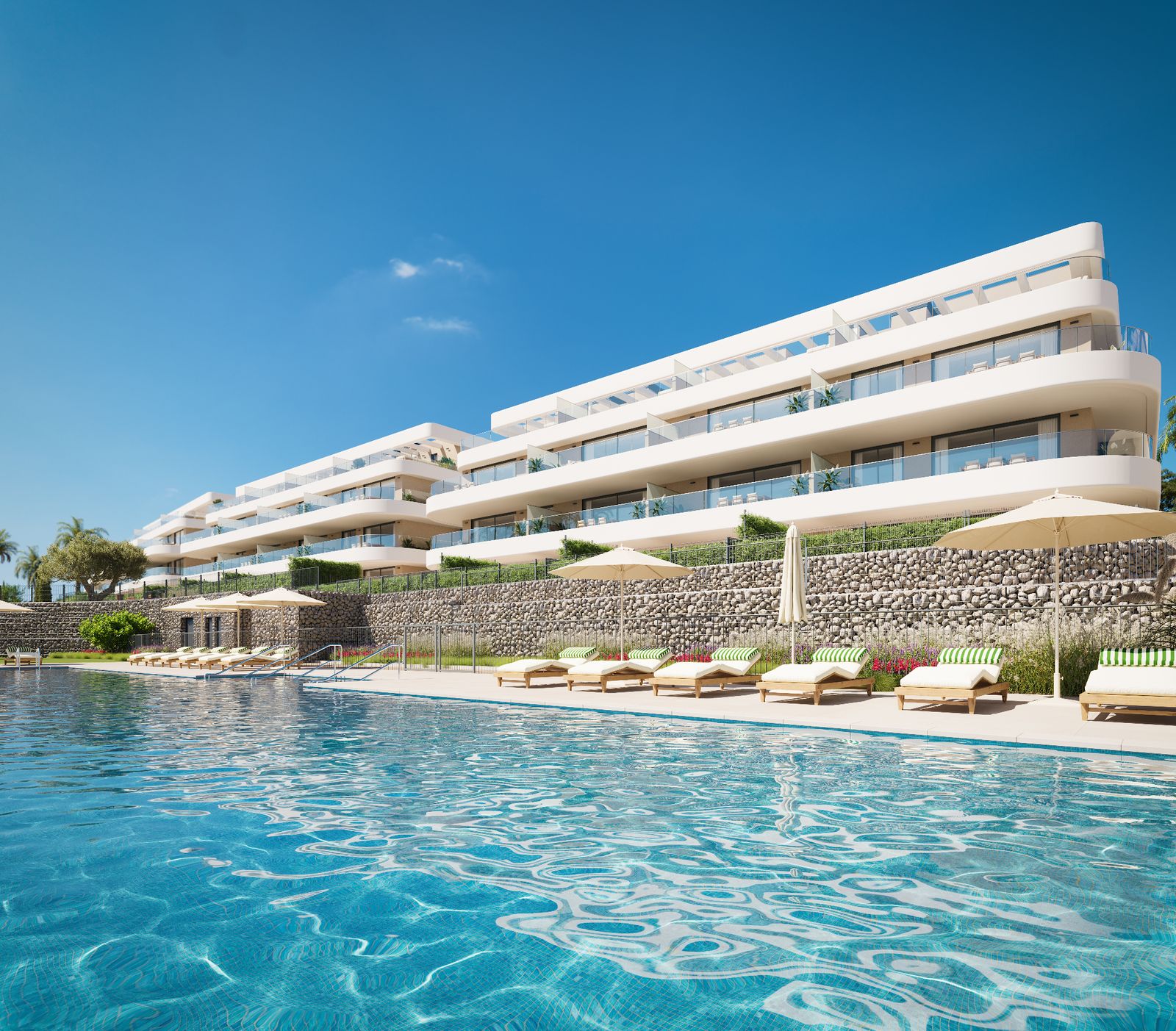 Recreación de la piscina de la promoción Unika Collection de Aedas Homes en Estepona, Málaga.