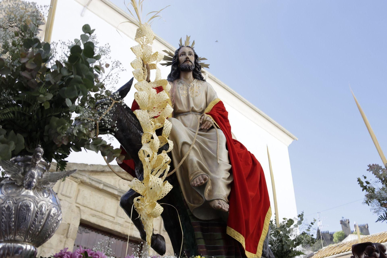 La procesión de la Borriquita en Almodóvar del Río, en imágenes