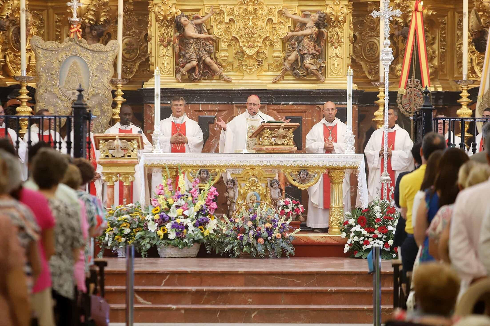Imágenes de la procesión eucarística y solemne Función del Voto en El Rocío Chico