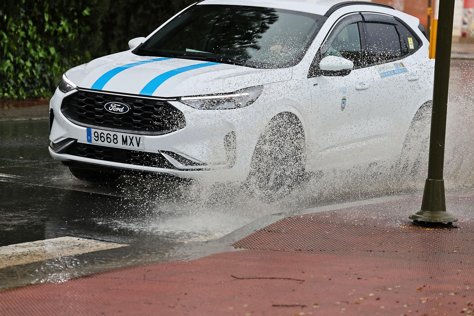 Las imágenes de la lluviosa mañana del jueves 13 de marzo en Huelva