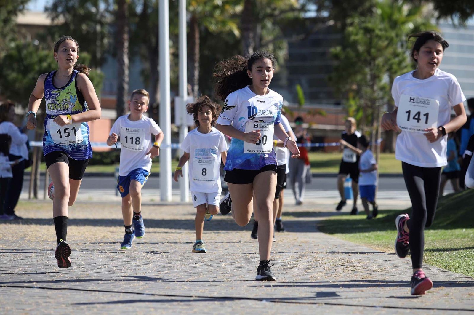 Imágenes de la carrera infantil previa a la "10K Puerta del Descubrimiento"