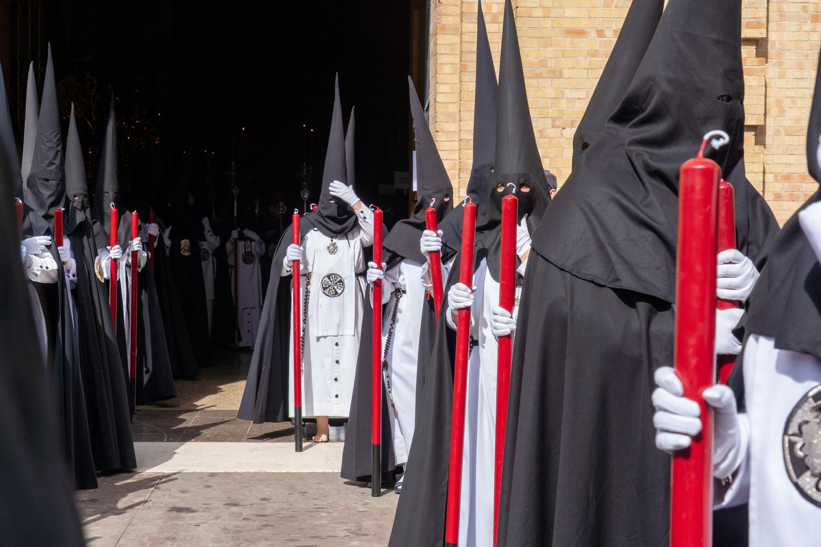 Domingo de Ramos: Imágenes de la procesión de La Sagrada Cena y Maria Santísima del Rosario