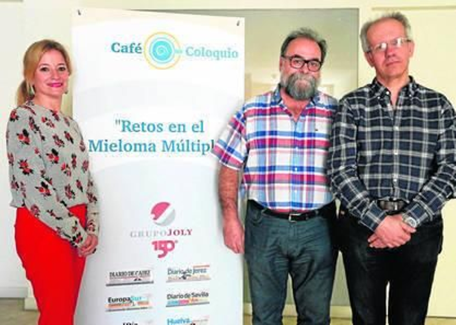 Los tres participantes en el coloquio organizado por el Grupo Joly.
