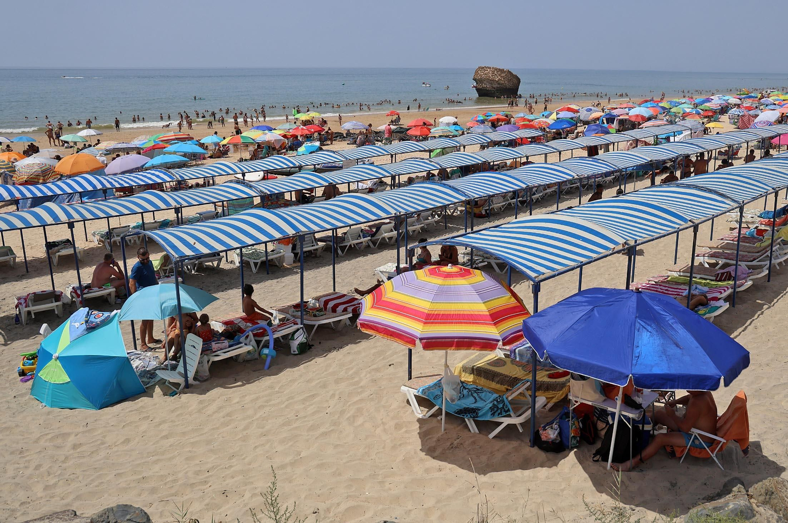 Imágenes del caluroso día en la playa de Matalascañas
