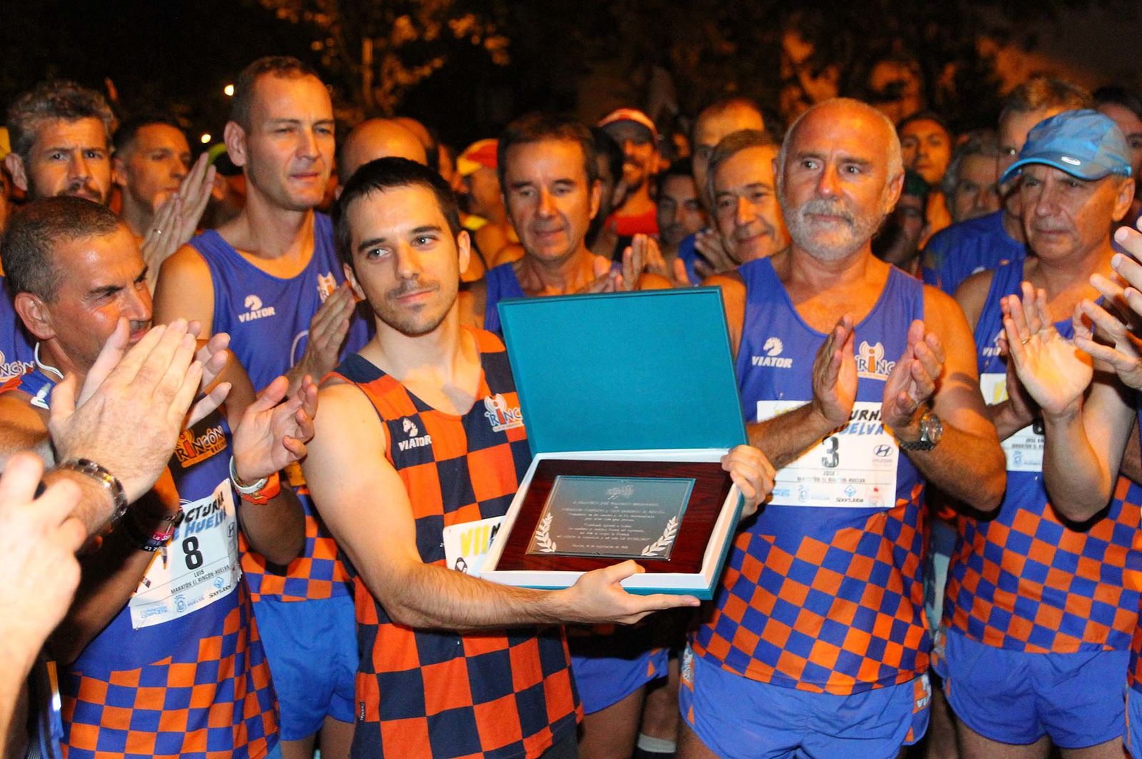 La VII Carrera Nocturna de Huelva en imágenes
