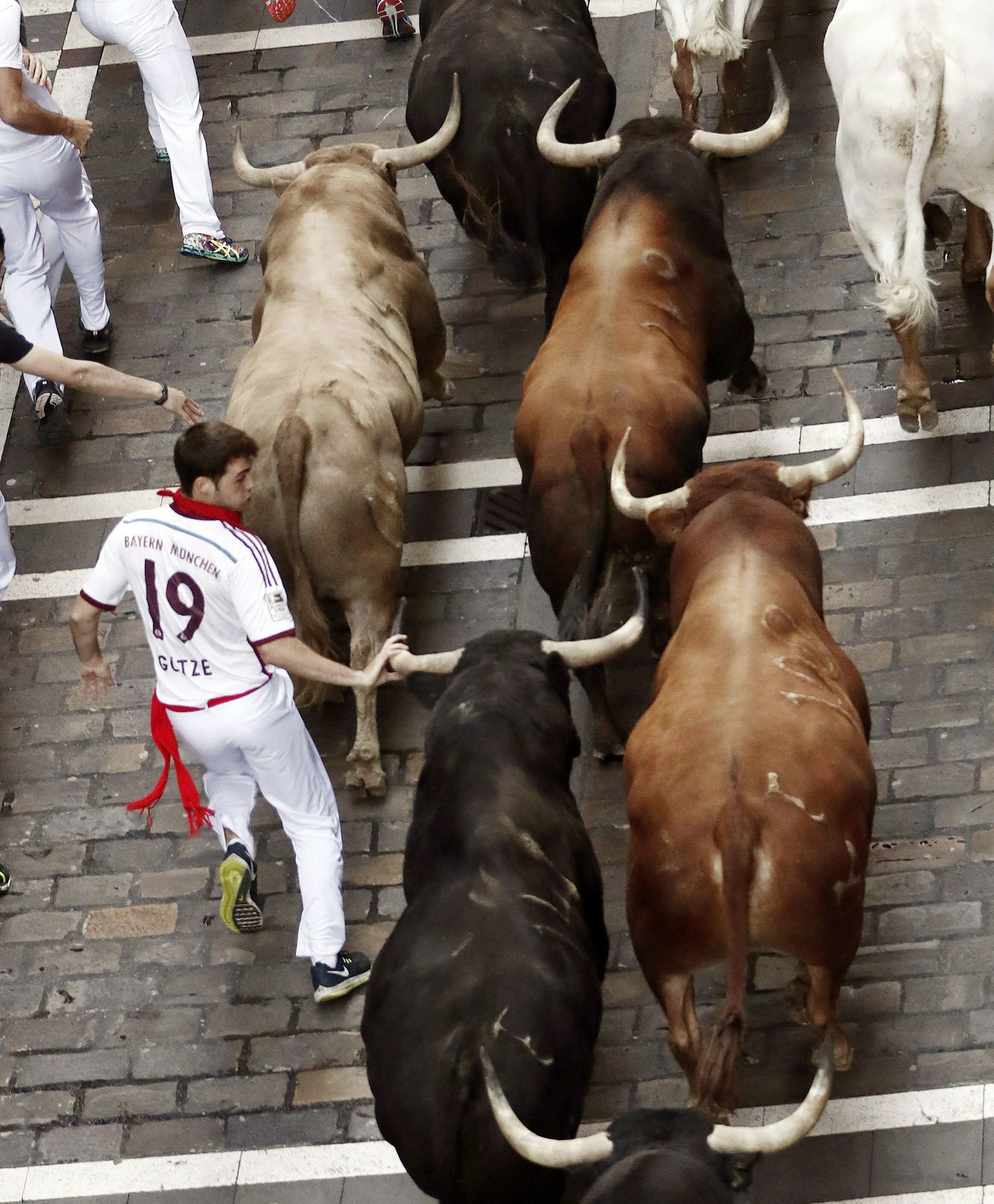 Las imágenes del sexto encierro de San Fermín 2019