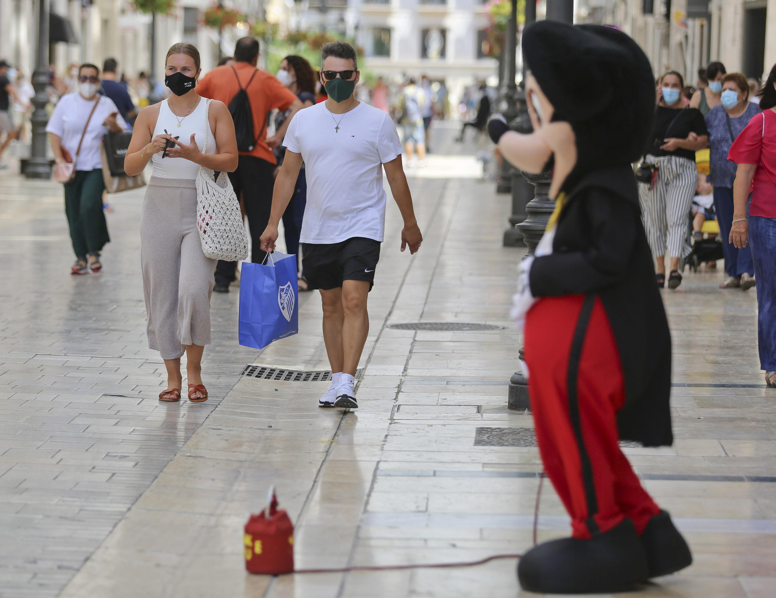 Fotos del primer día de mascarillas obligatorias en las playas y el Centro de Málaga