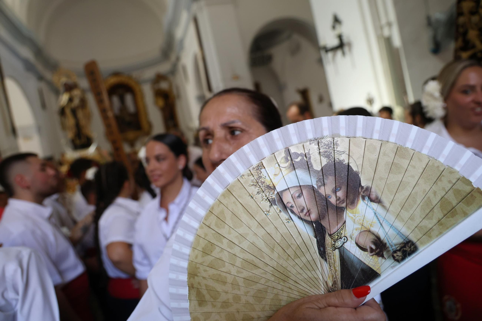 La procesión de la Virgen del Carmen en El Palo, en Málaga, en imágenes