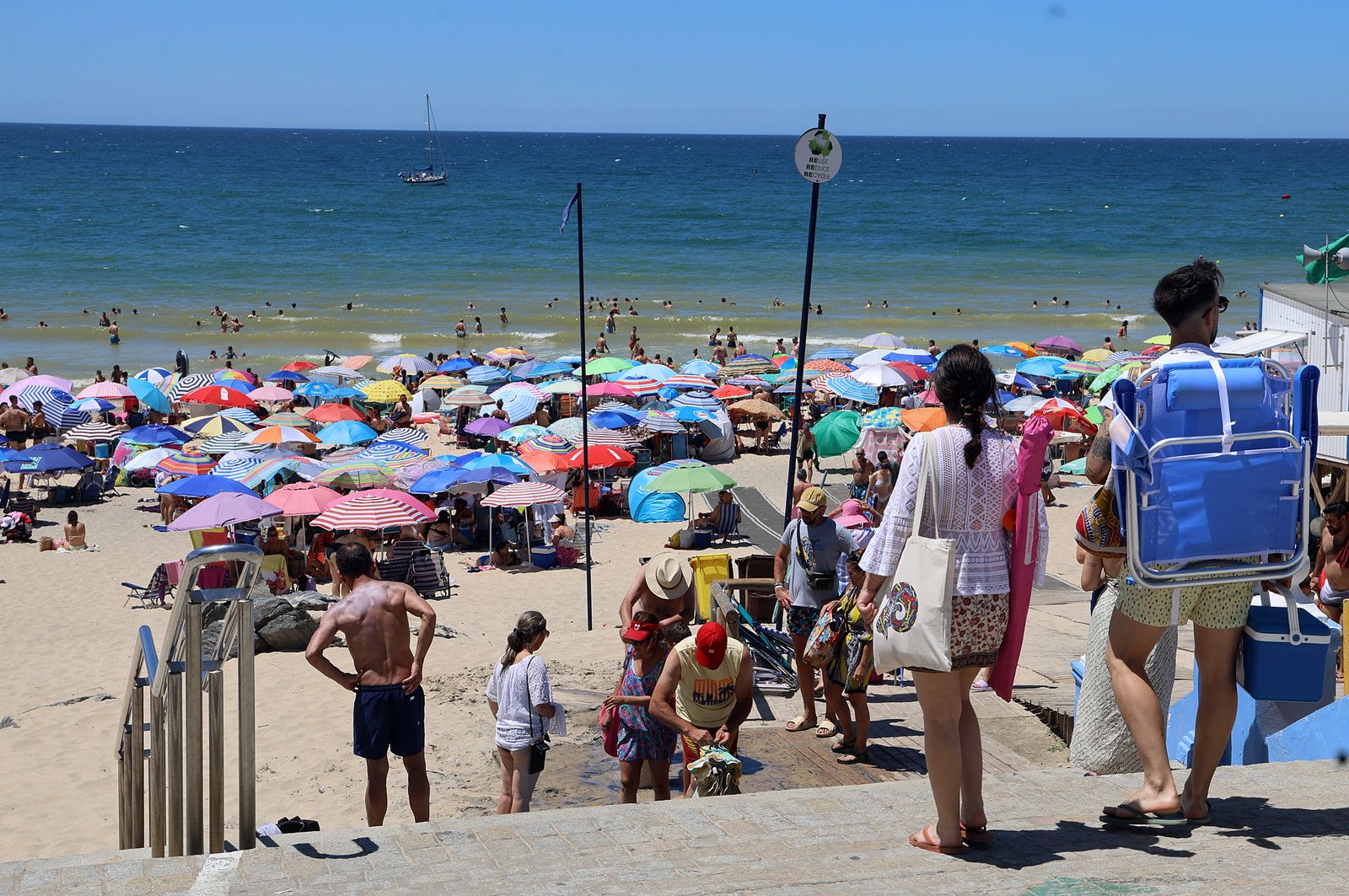 Imágenes de una mañana de calor y playa en Matalascañas