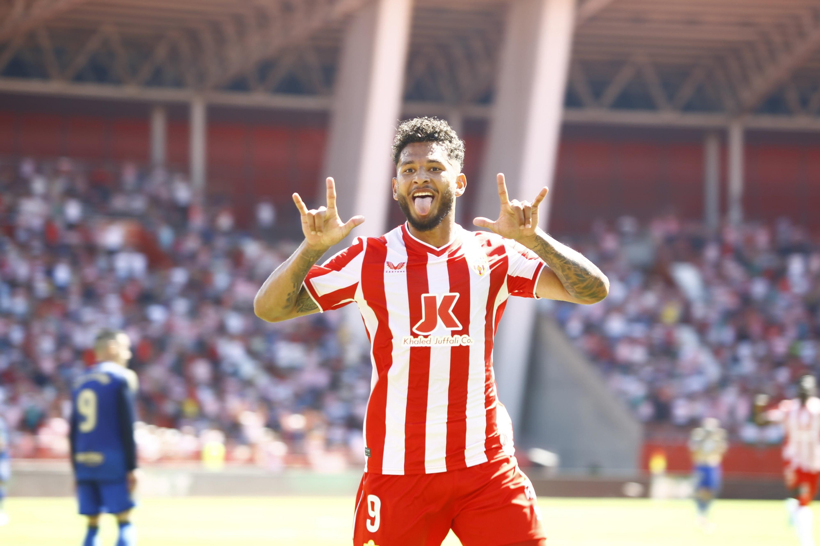 Imágenes del empate a 3 de la U.D. Almería y el Granada C.F.