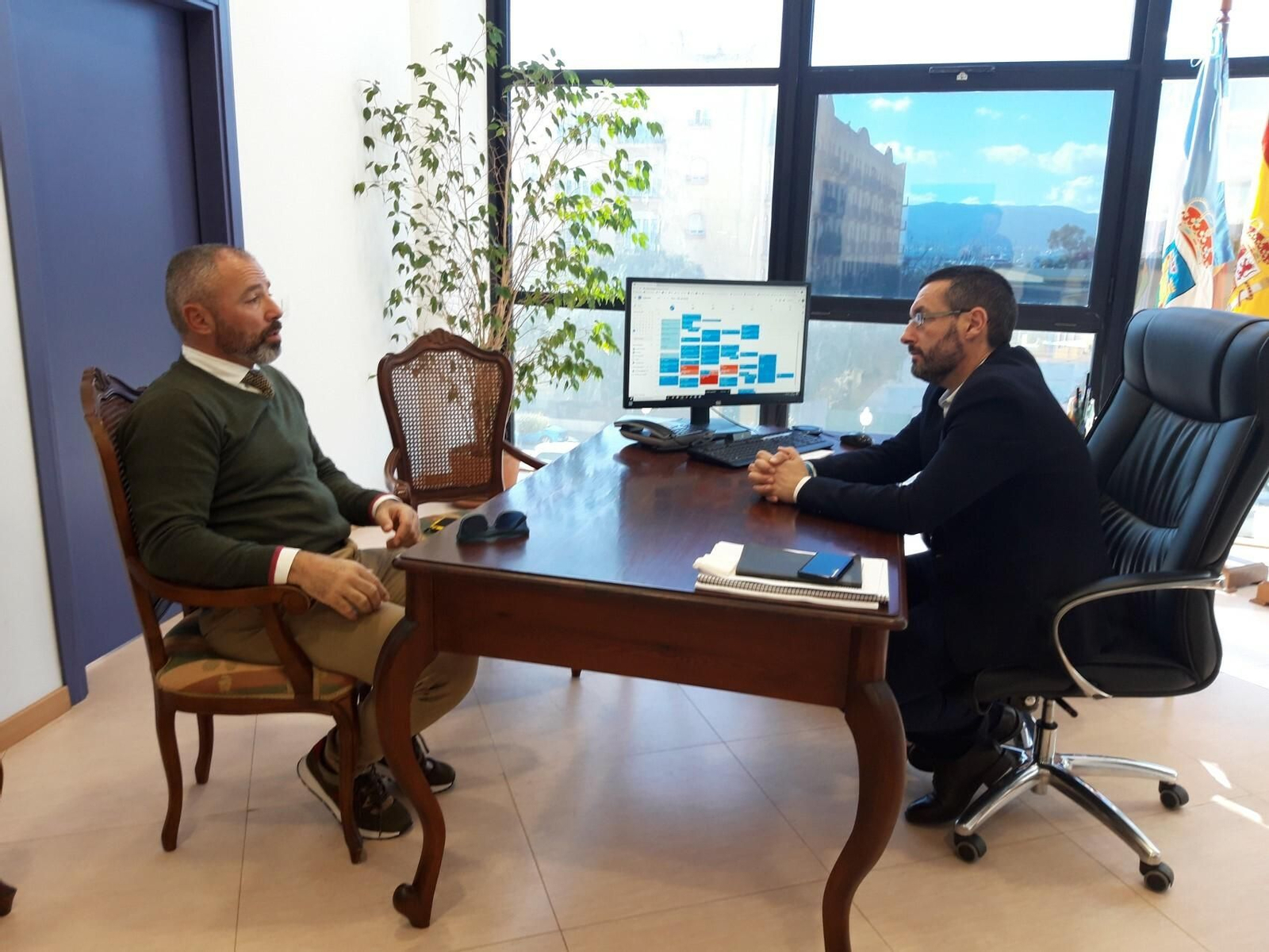 Alexis García y Juan Franco durante la reunión