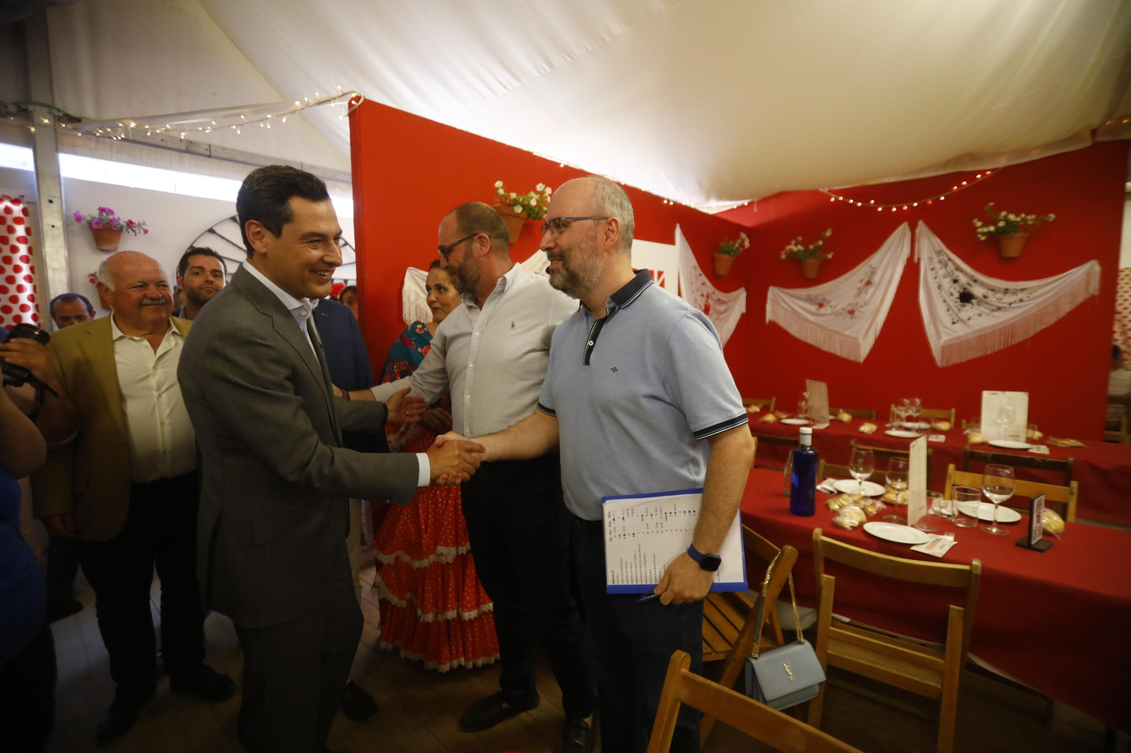 La visita de Juanma Moreno a la Feria de Córdoba, en imágenes