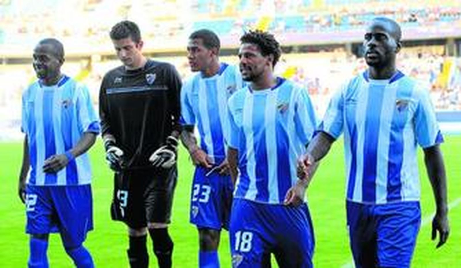 Sandro Silva, Galatto, Rondón, Eliseu y Quincy, retirándose a los vestuarios el día de la presentación del Málaga CF.