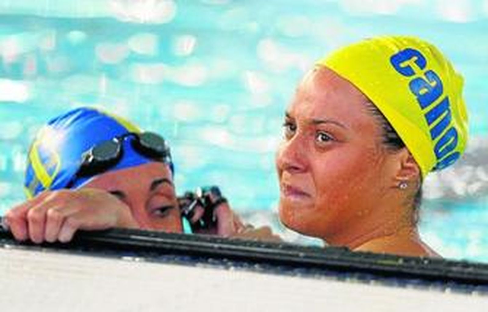 Duane Rocha, con gesto de decepción, tras acabar la prueba de los 100 metros espalda.