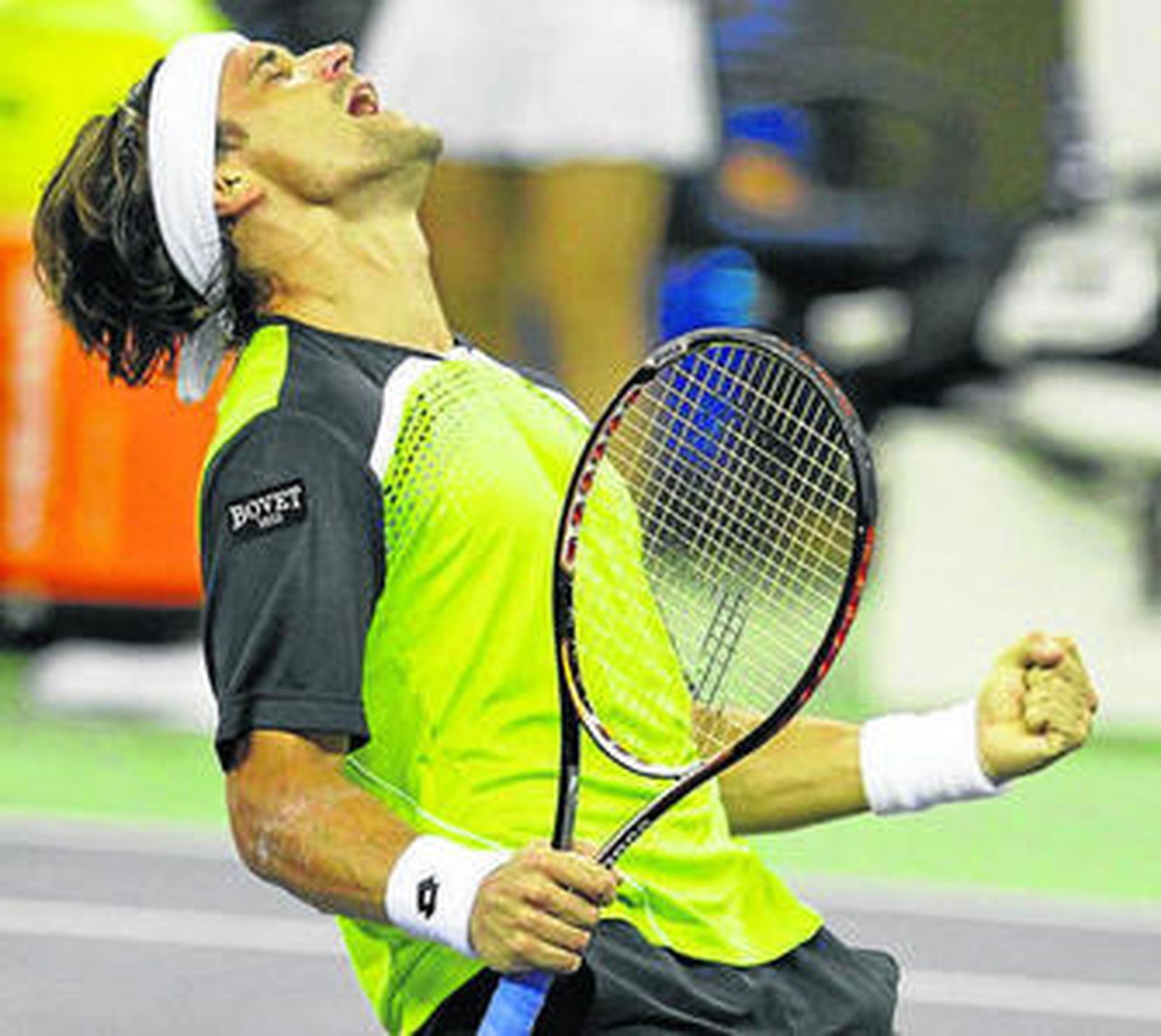 David Ferrer celebra su victoria tras ganar a Feliciano López.