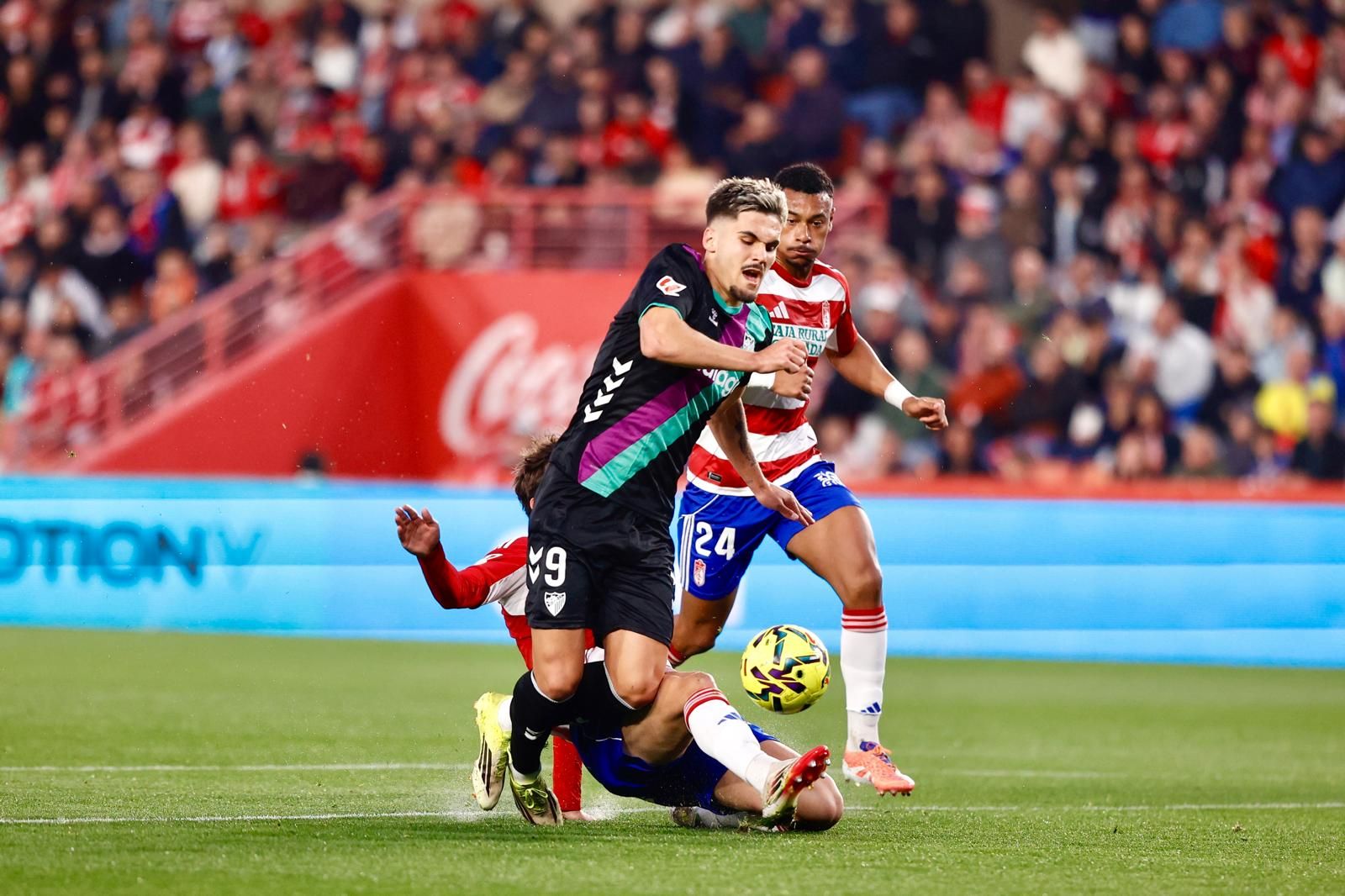 El Granada-Málaga CF, en fotos