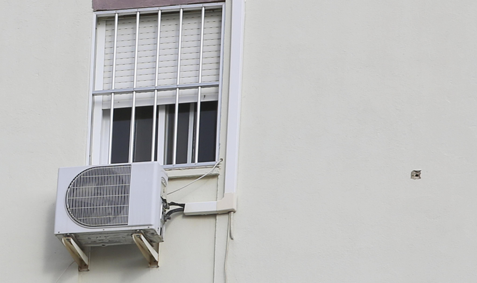 Disparo en la pared de uno de los bloques de la zona del tiroteo en Palma-Palmilla.