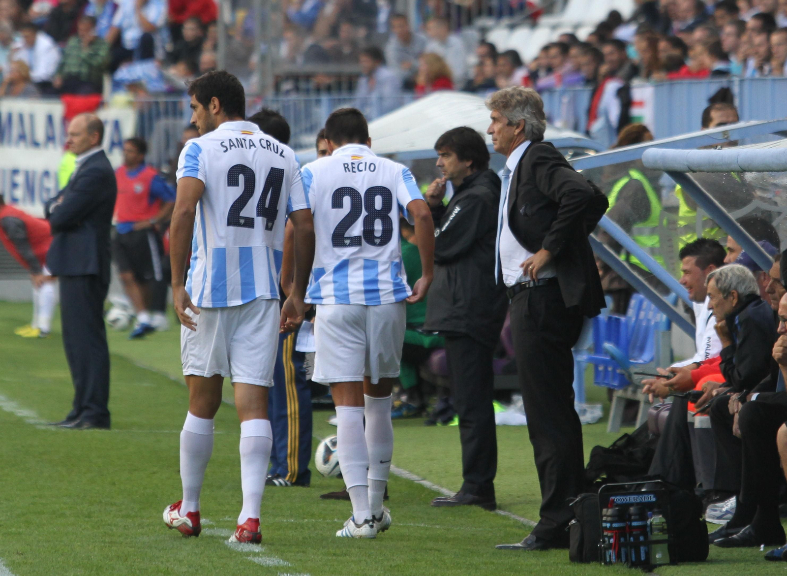 Santa Cruz y Recio, a punto de entrar en un partido con Pellegrini como entrenador