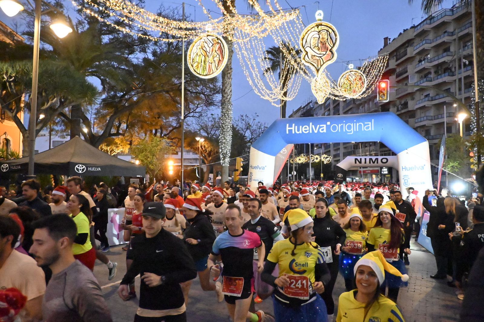 Búscate en las mejores fotografías de la San Silvestre de Huelva 2025