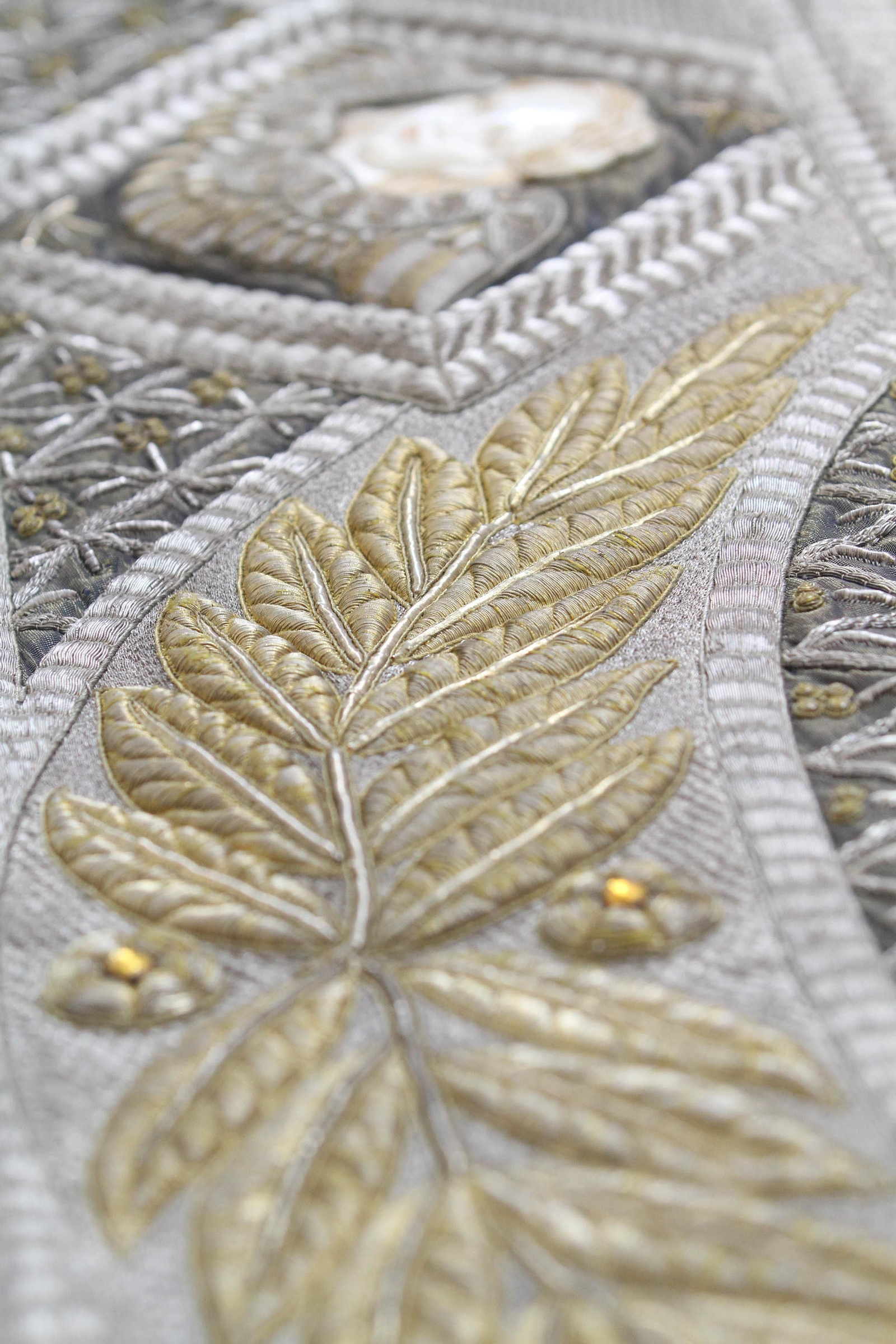 El manto de la Virgen de los Ángeles ya restaurado, en imágenes