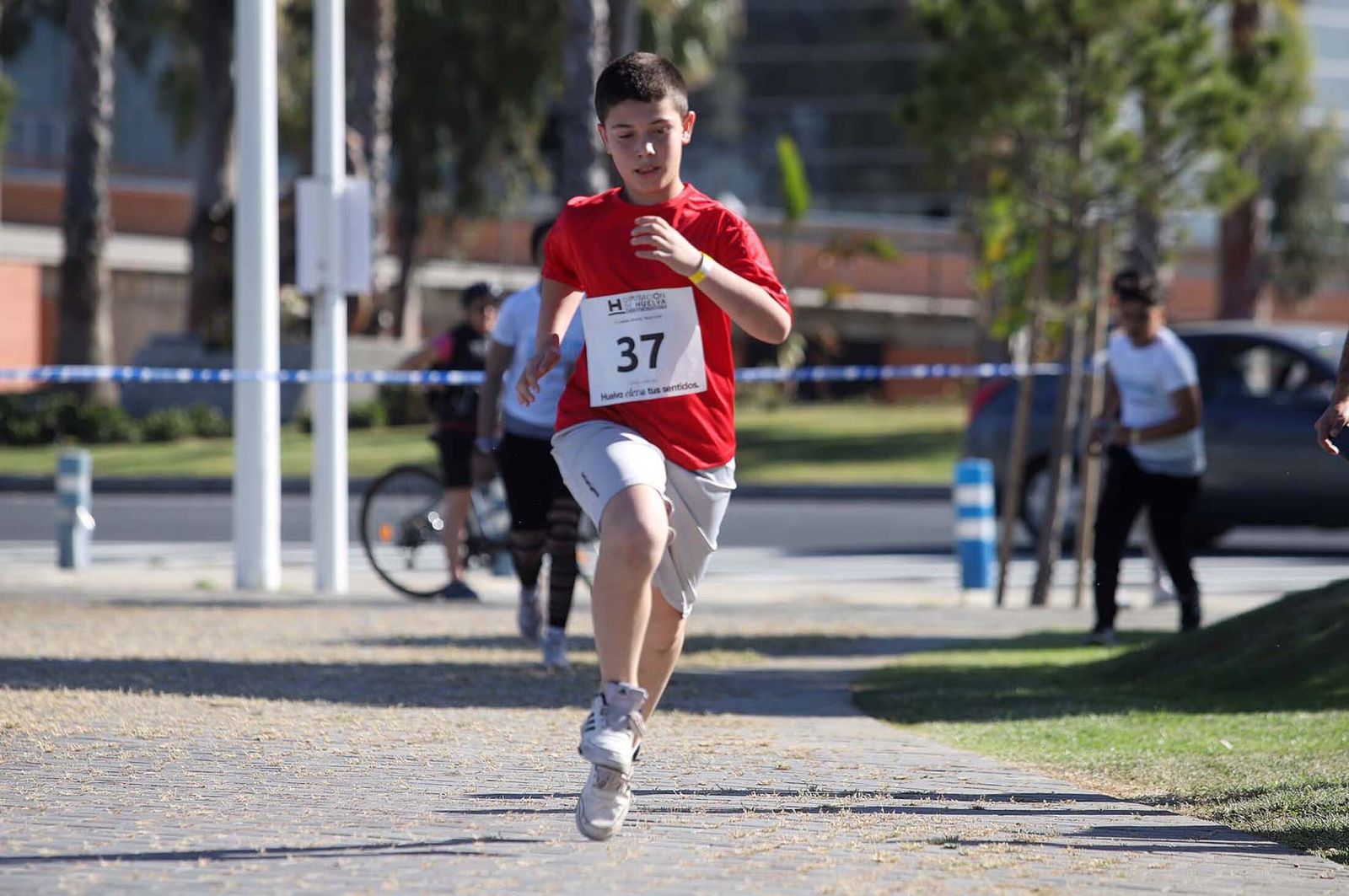 Imágenes de la carrera infantil previa a la "10K Puerta del Descubrimiento"