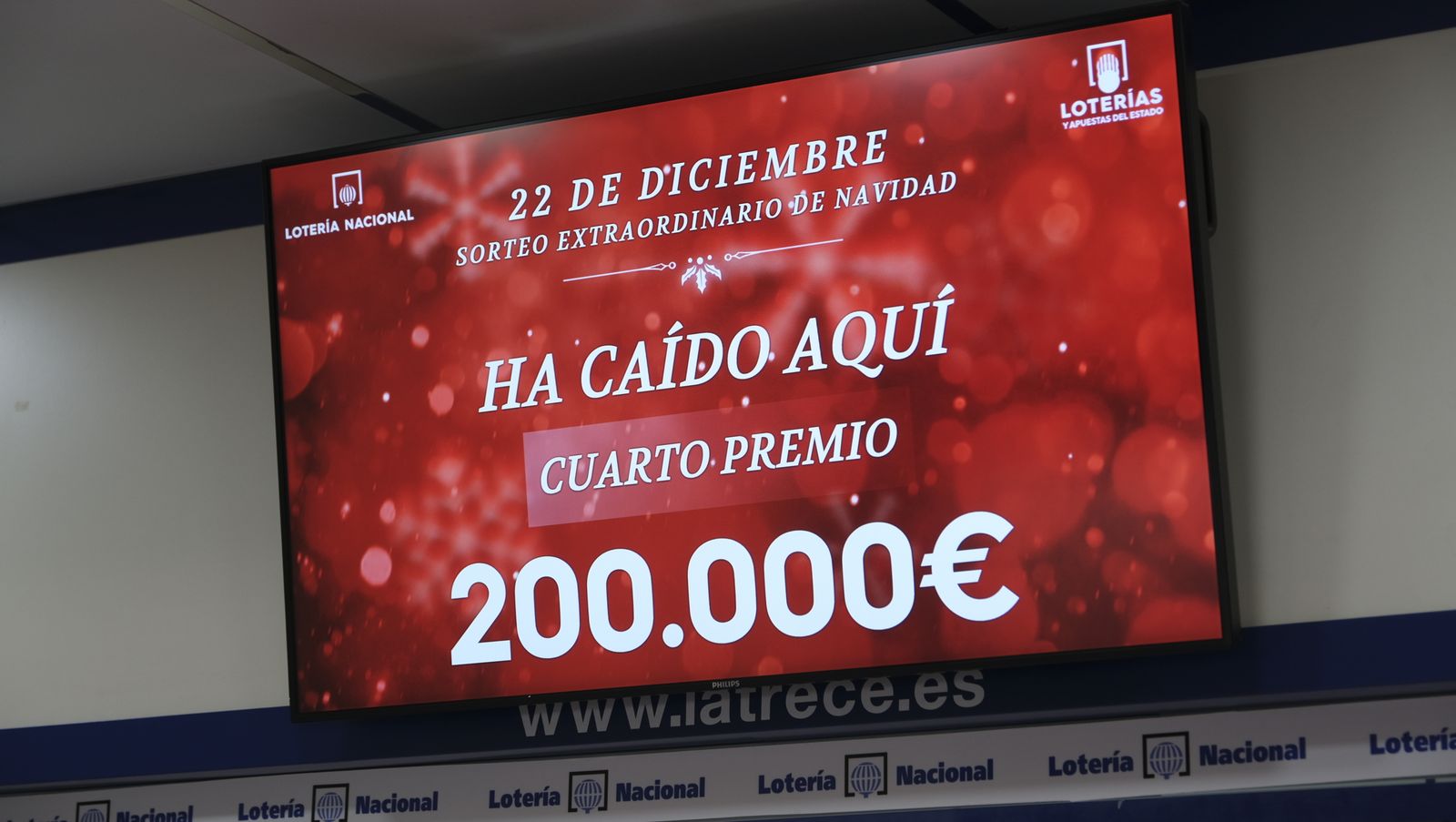Imágenes de los premiados por la Lotería de Navidad en Almería y provincia