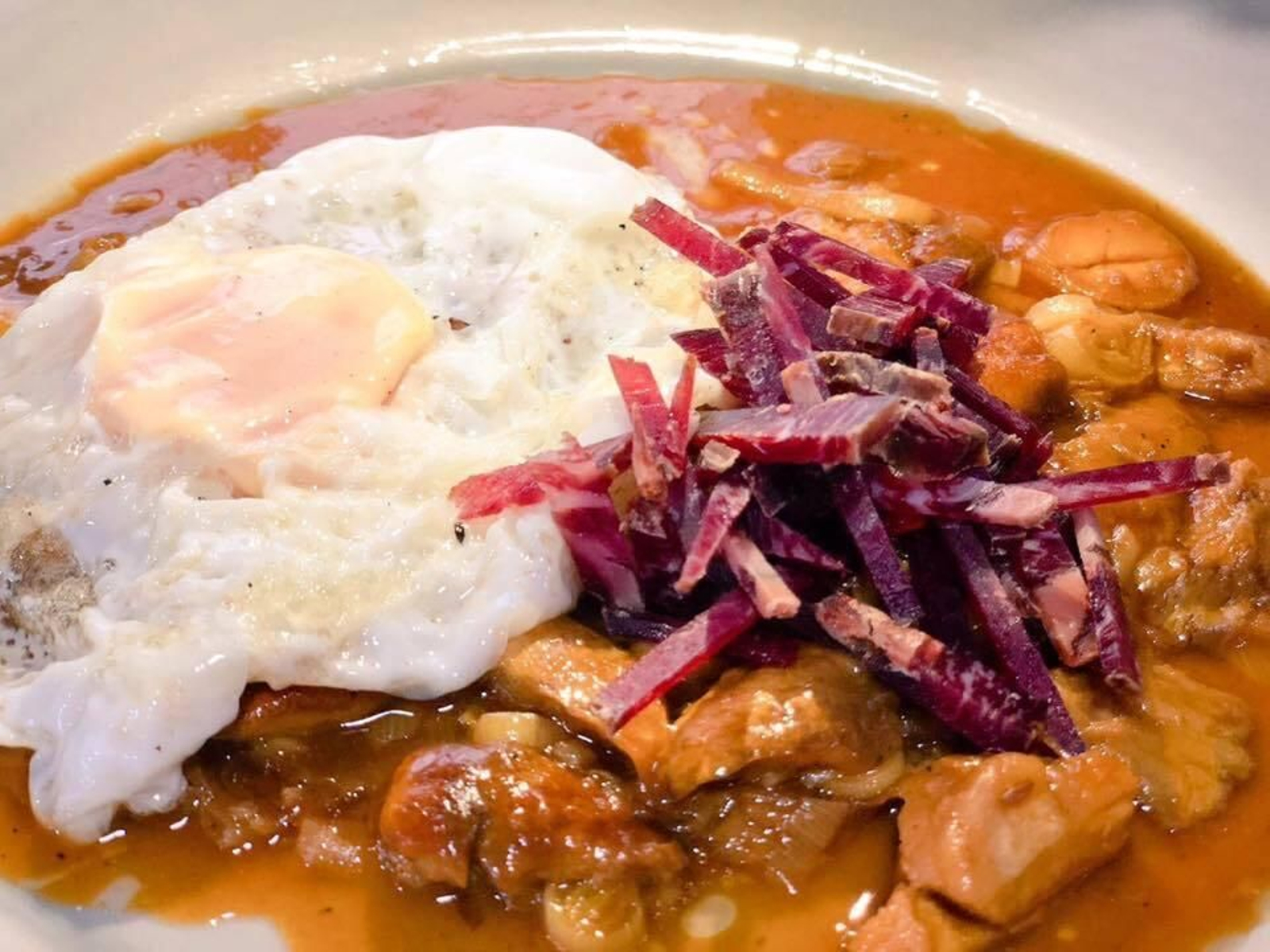 Tanas, jugo de oreja y lomito ibérico