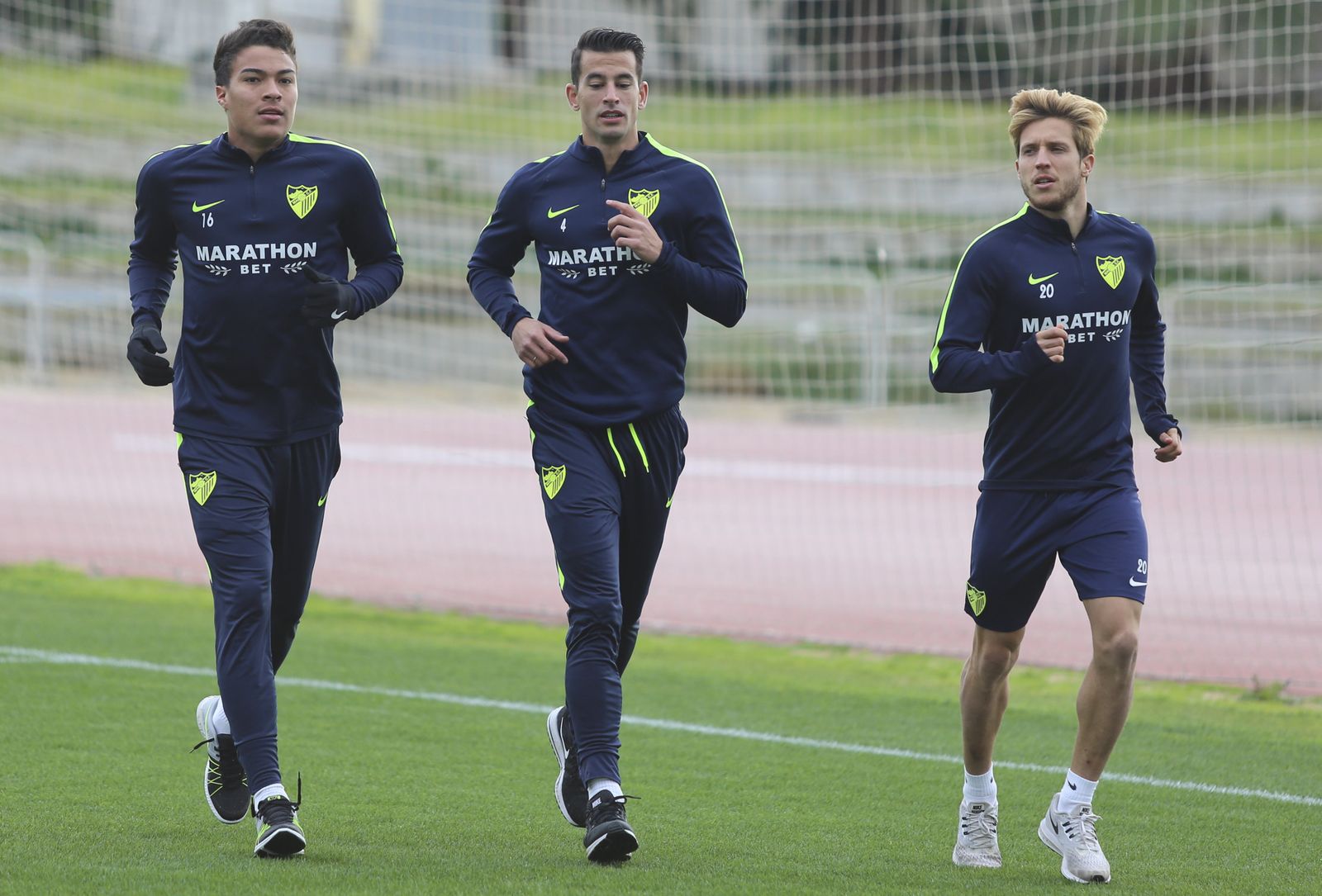 Peñaranda y Luis Hernández calientan para un entrenamiento.