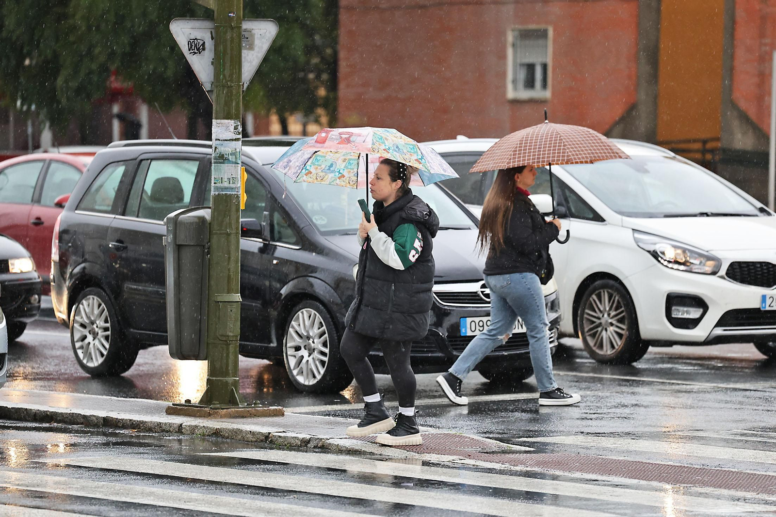 Las imágenes de la lluviosa mañana del jueves 13 de marzo en Huelva