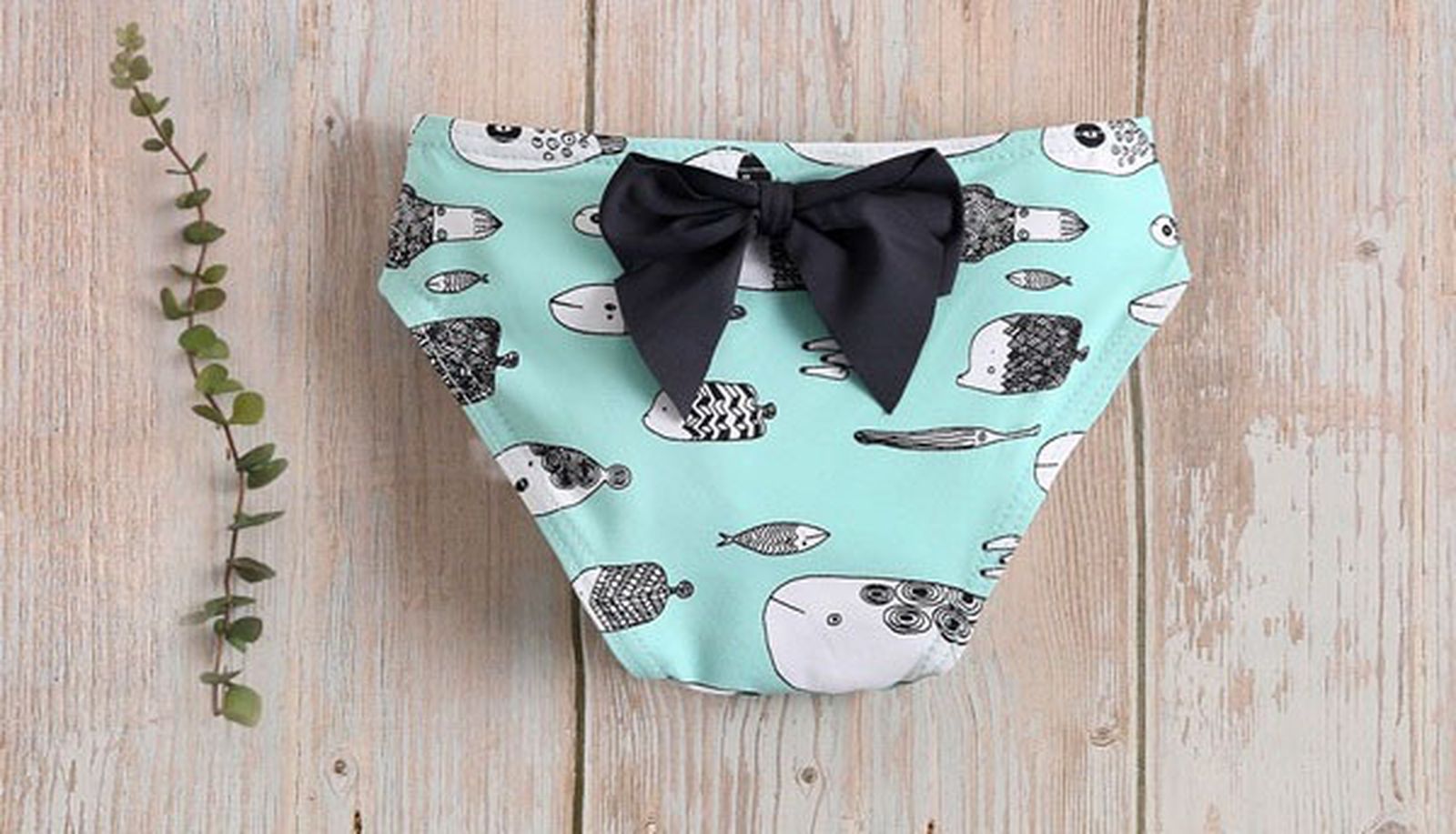 Culetín bebé niña de peces con lazo en espalda de Dadati, 17,99 euros.