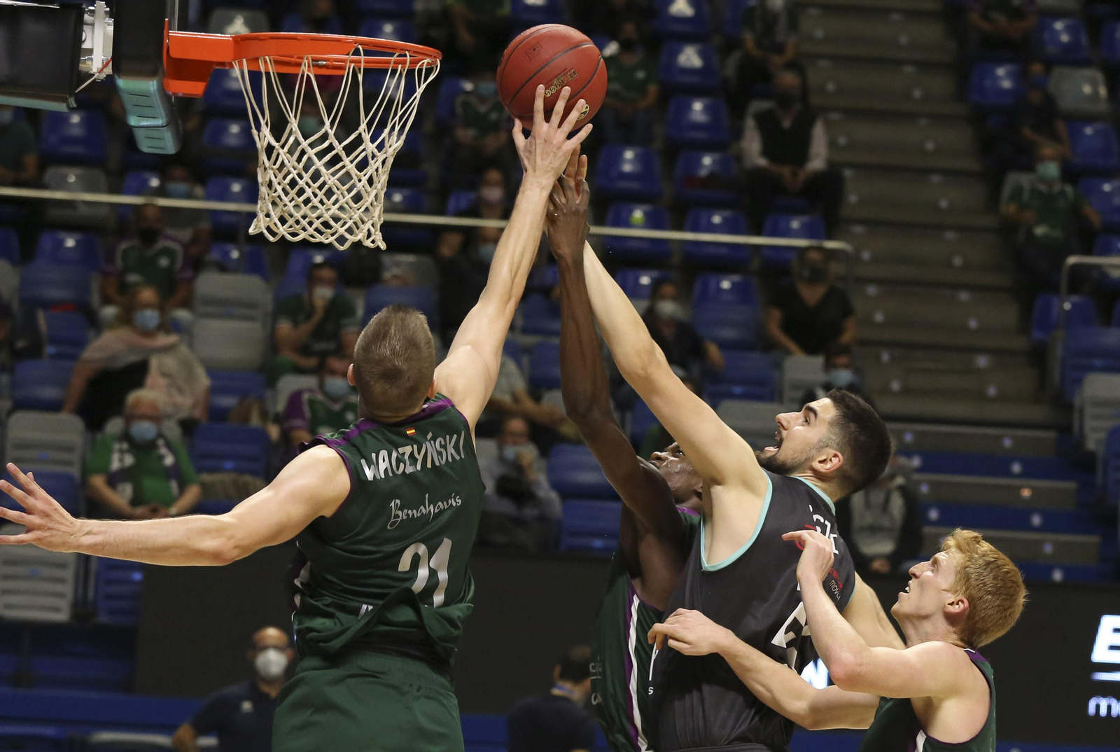 Los cinco años de Adam Waczynski en el Unicaja, en fotos