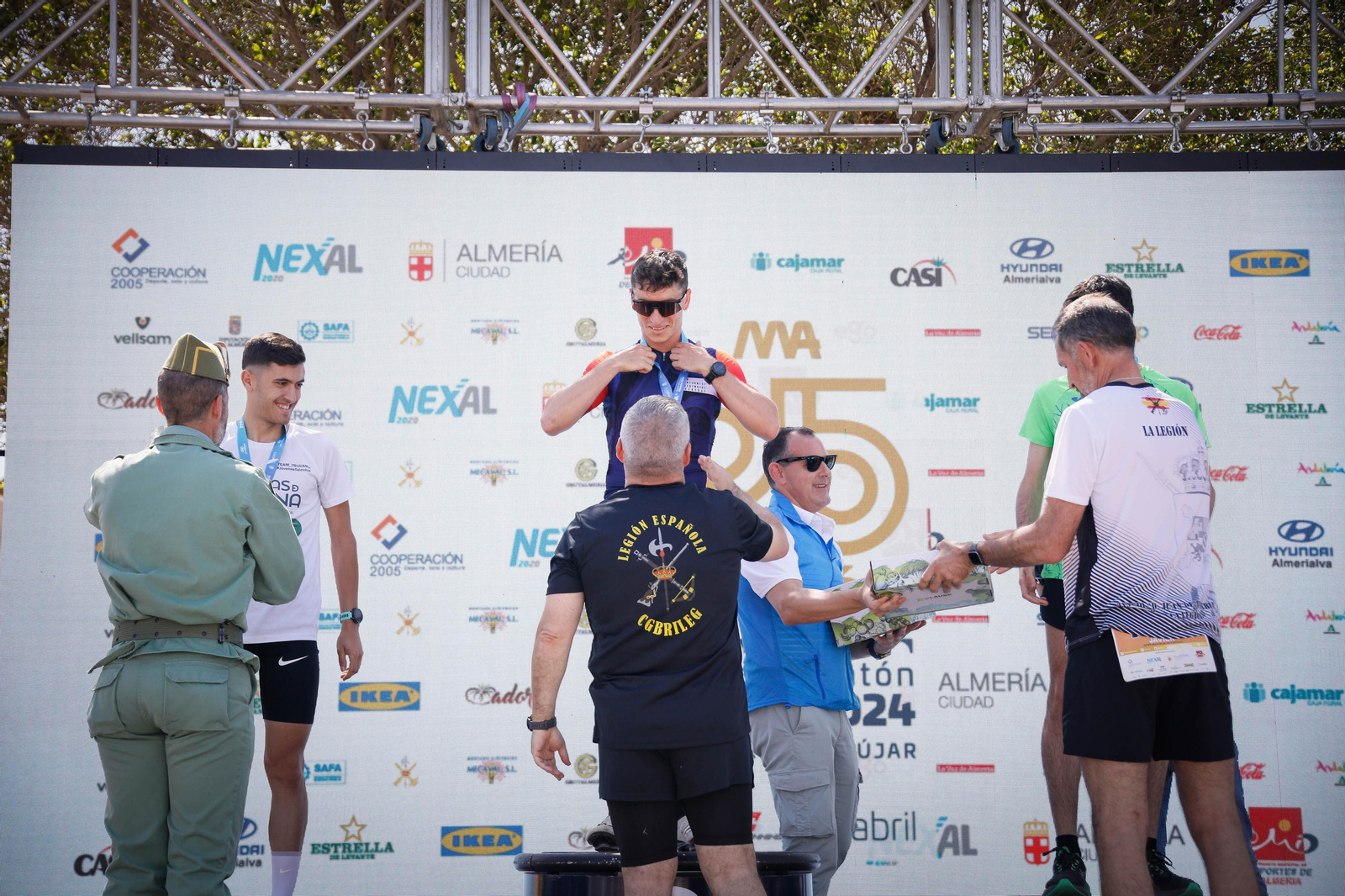 Imágenes de los premiados en la Media maratón de la Cuidad de Almería