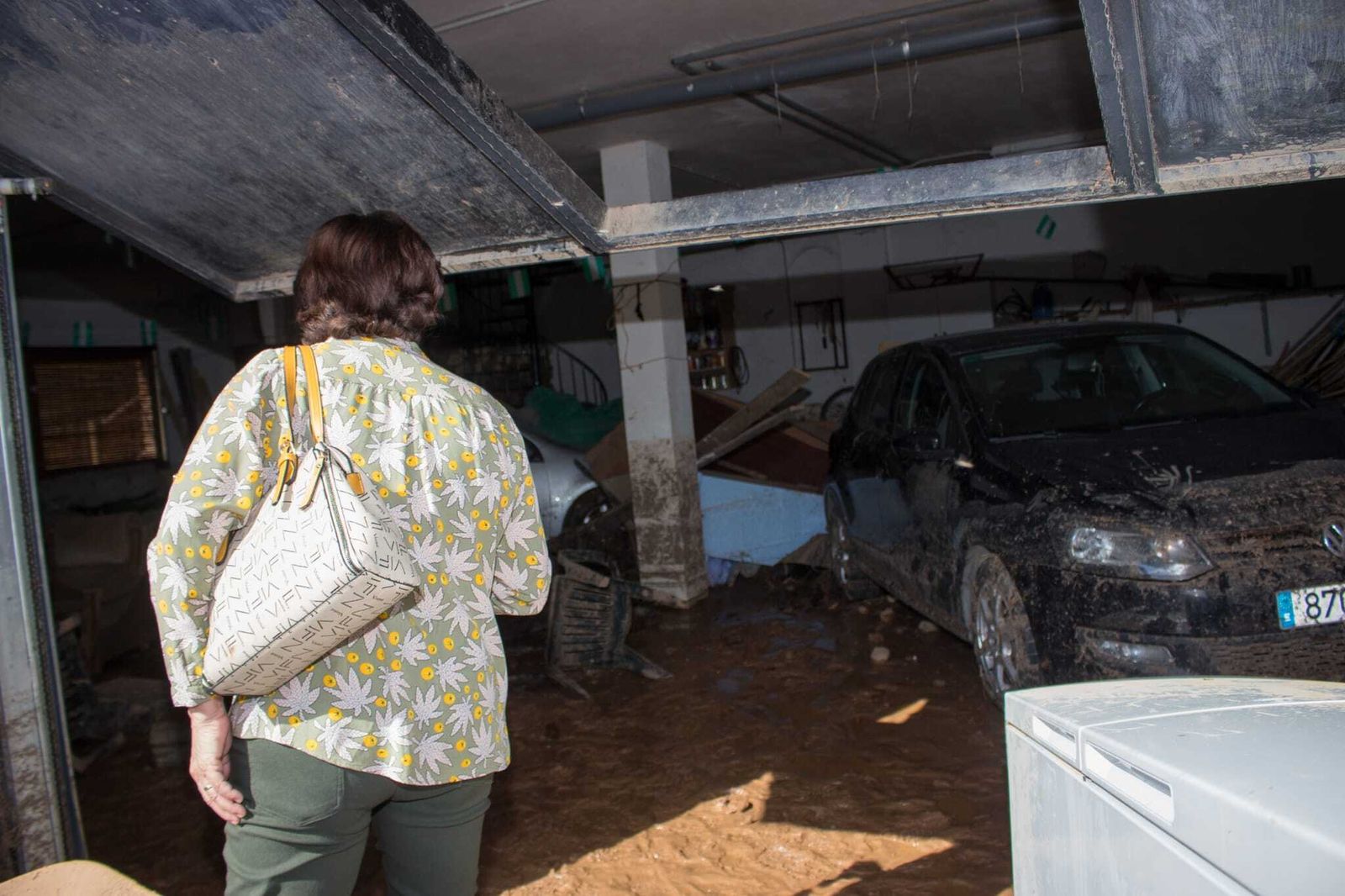 Fotos: la familia que tuvo que salir de su casa buceando por la tormenta en Granada