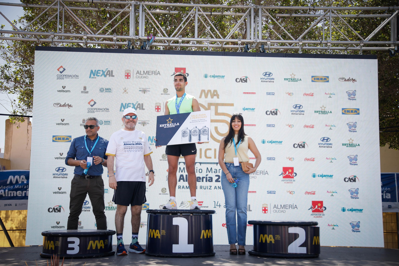 Imágenes de los premiados en la Media maratón de la Cuidad de Almería