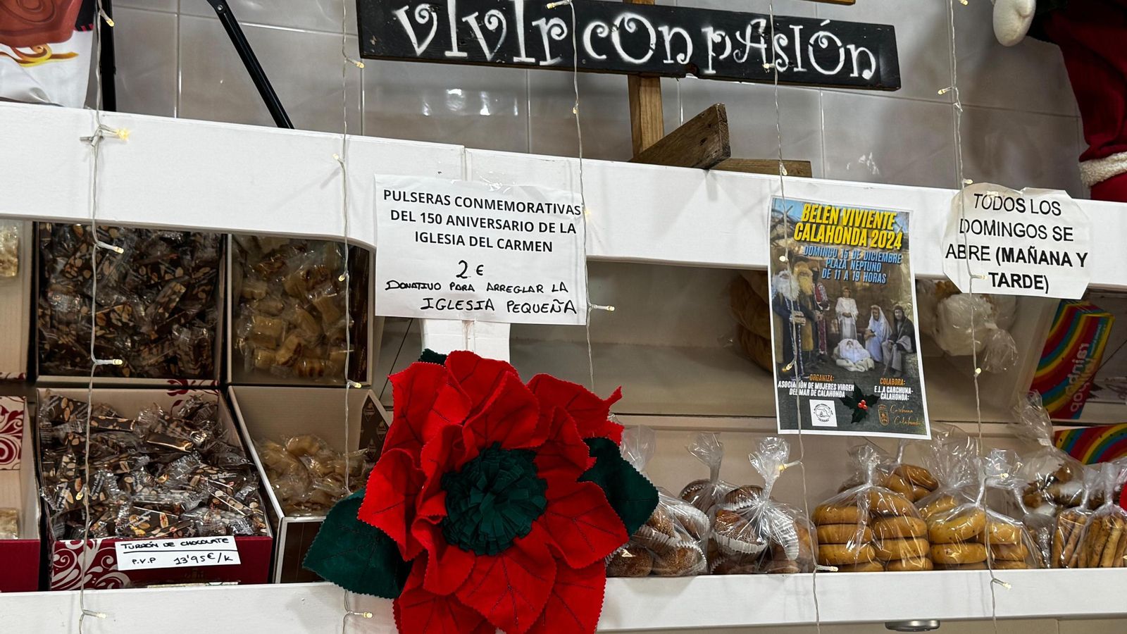 Un cartel en la panaderia ofrece pulseras conmemorativas Un cartel en la panaderia ofrece pulseras conmemorativas