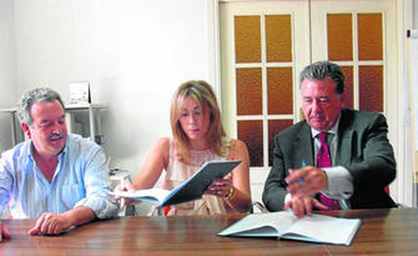 José Francisco Navarro (Seat), María José Flores (Vera Import) y José Tara (Asisa Almería).
