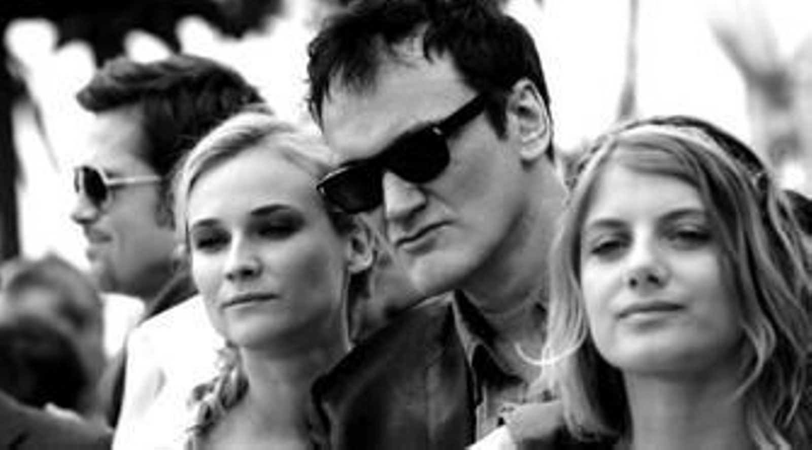 Tarantino, rodeado por Brad Pitt, Diane Kruger y Melanie Lauren.