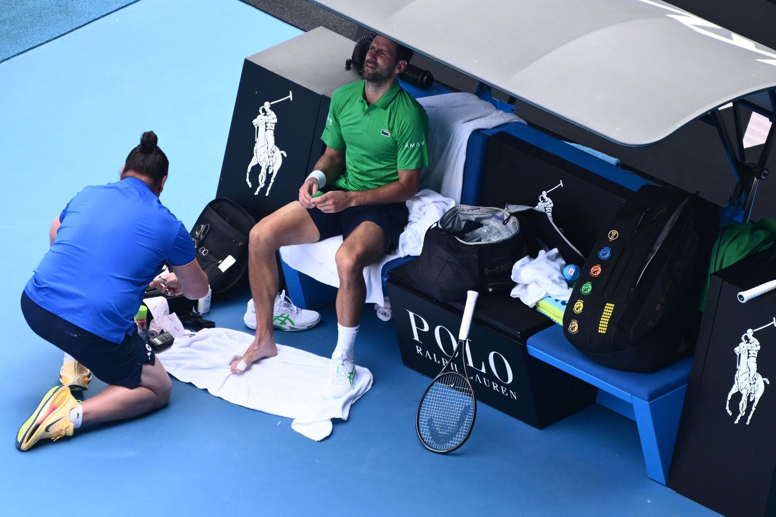 Las fotos de la retirada de Musetti ante Djokovic y del resto de cuartos de final