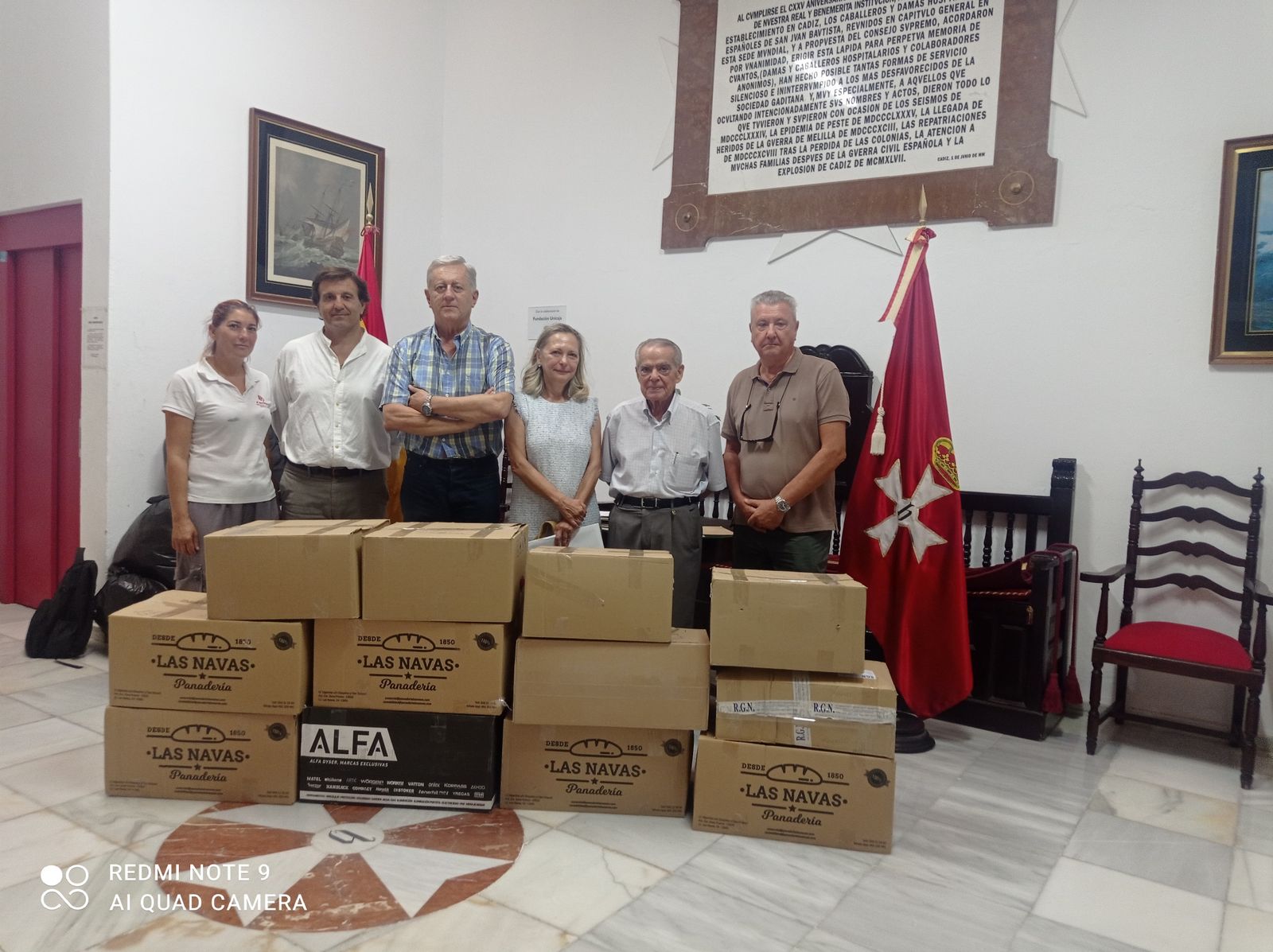 Entrega de la donación a Cáritas en Caballeros Hospitalarios.