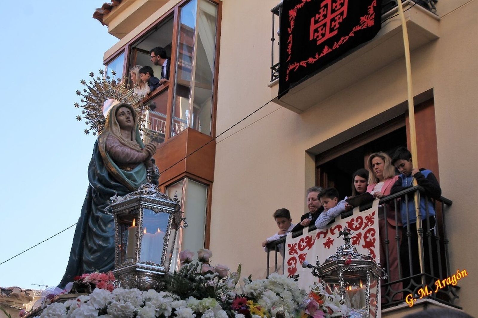 Nuestra Señora de los Desamparados (Virgen del Río) por las calles de la localidad.