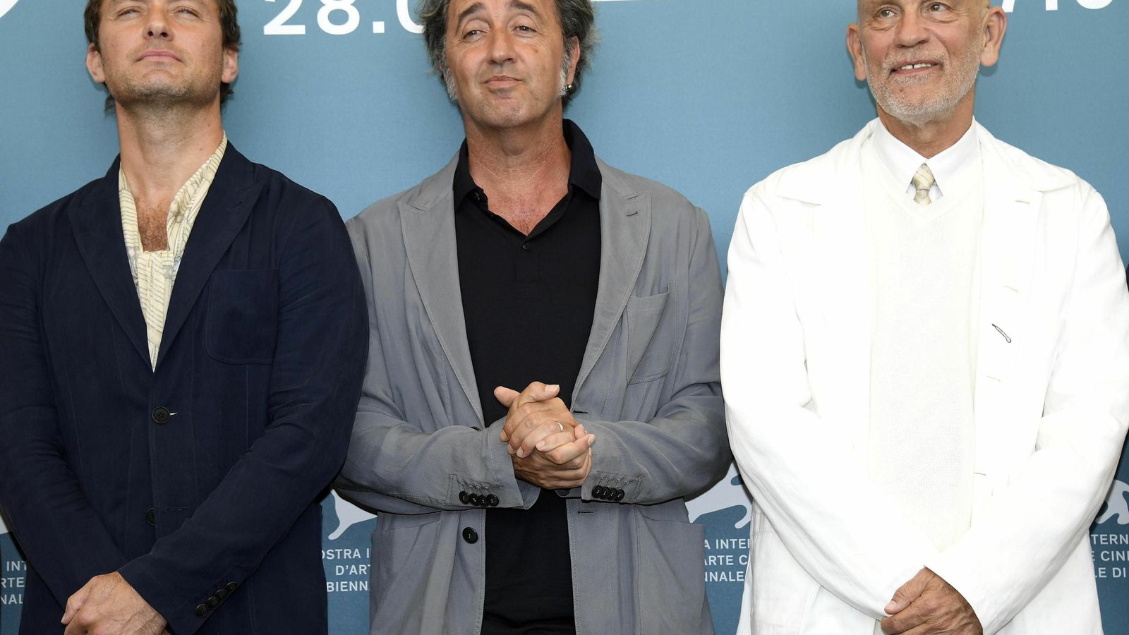 Jude Law, Paolo Sorrentino y John Malkovich, en el Lido veneciano.