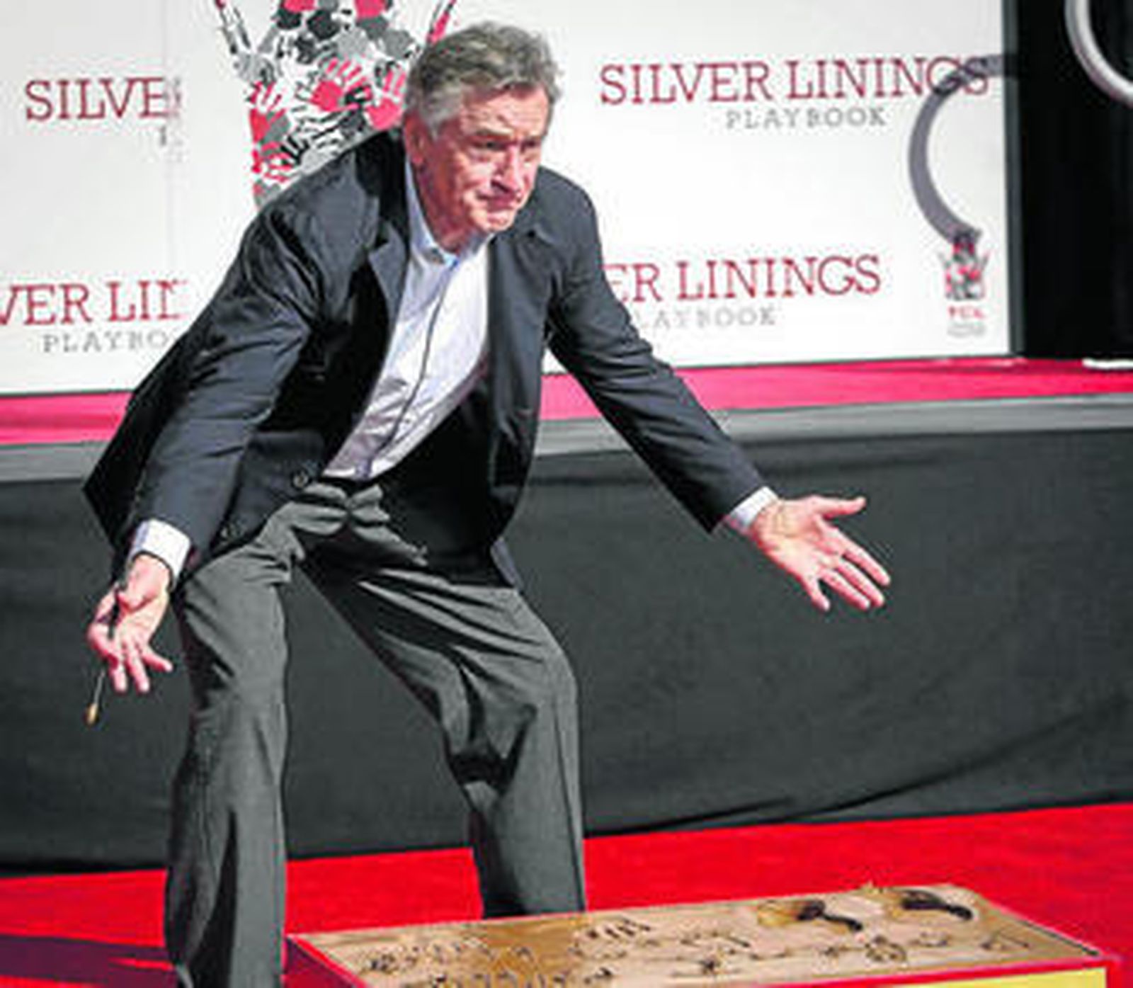 De Niro, después de dejar las huellas de sus manos.