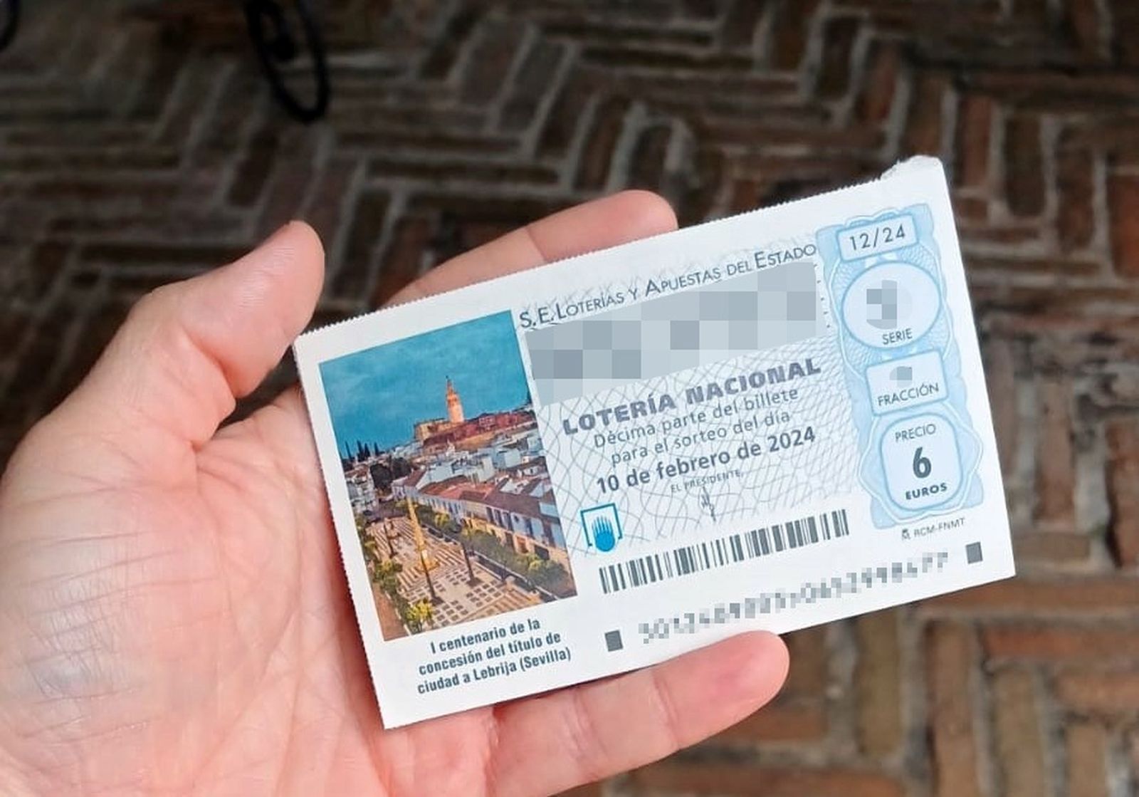 La Lotería Nacional presenta el décimo dedicado al I Centenario de la concesión del título de ciudad a Lebrija