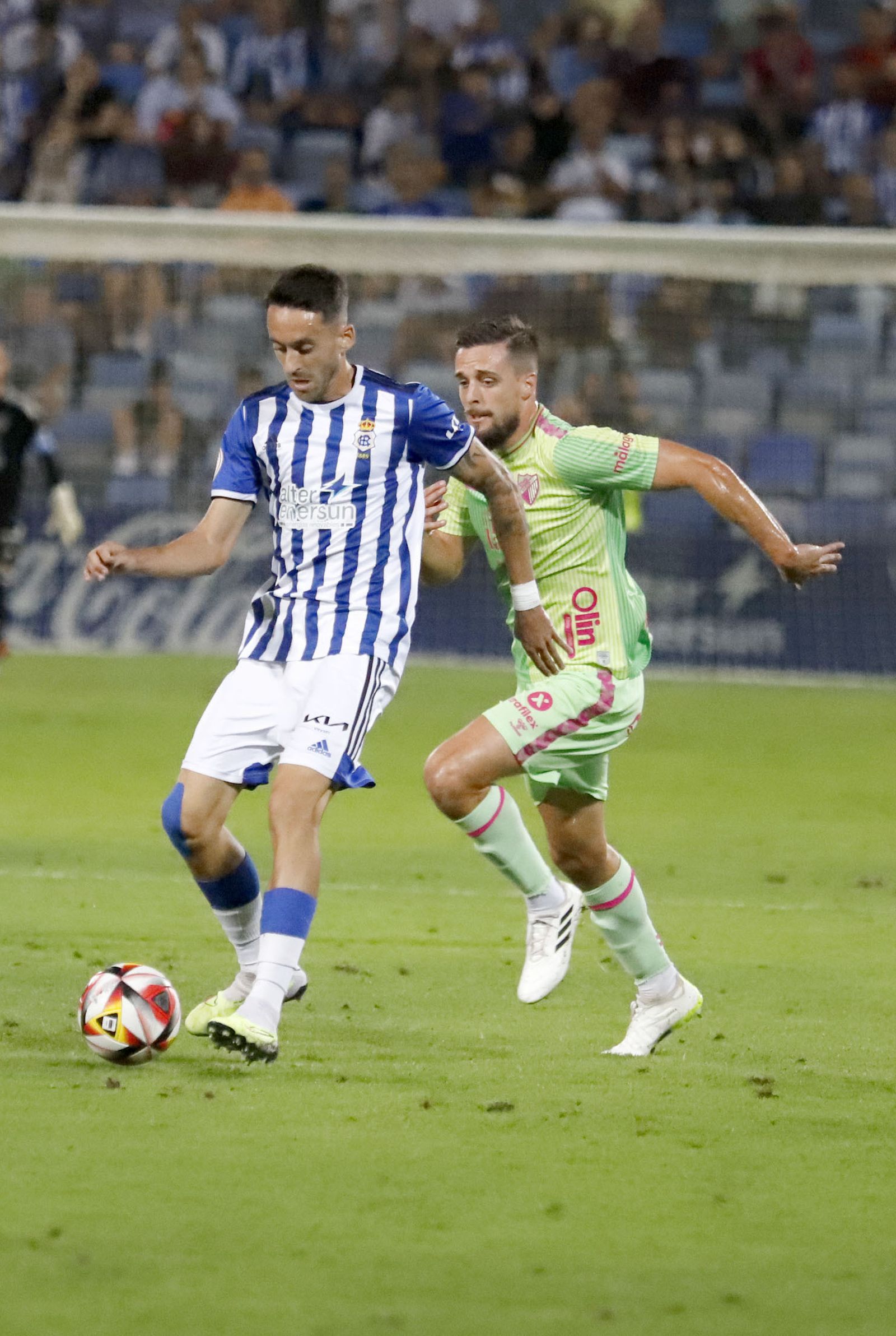 Imágenes del encuentro entre el Recreativo de Huelva y el Málaga