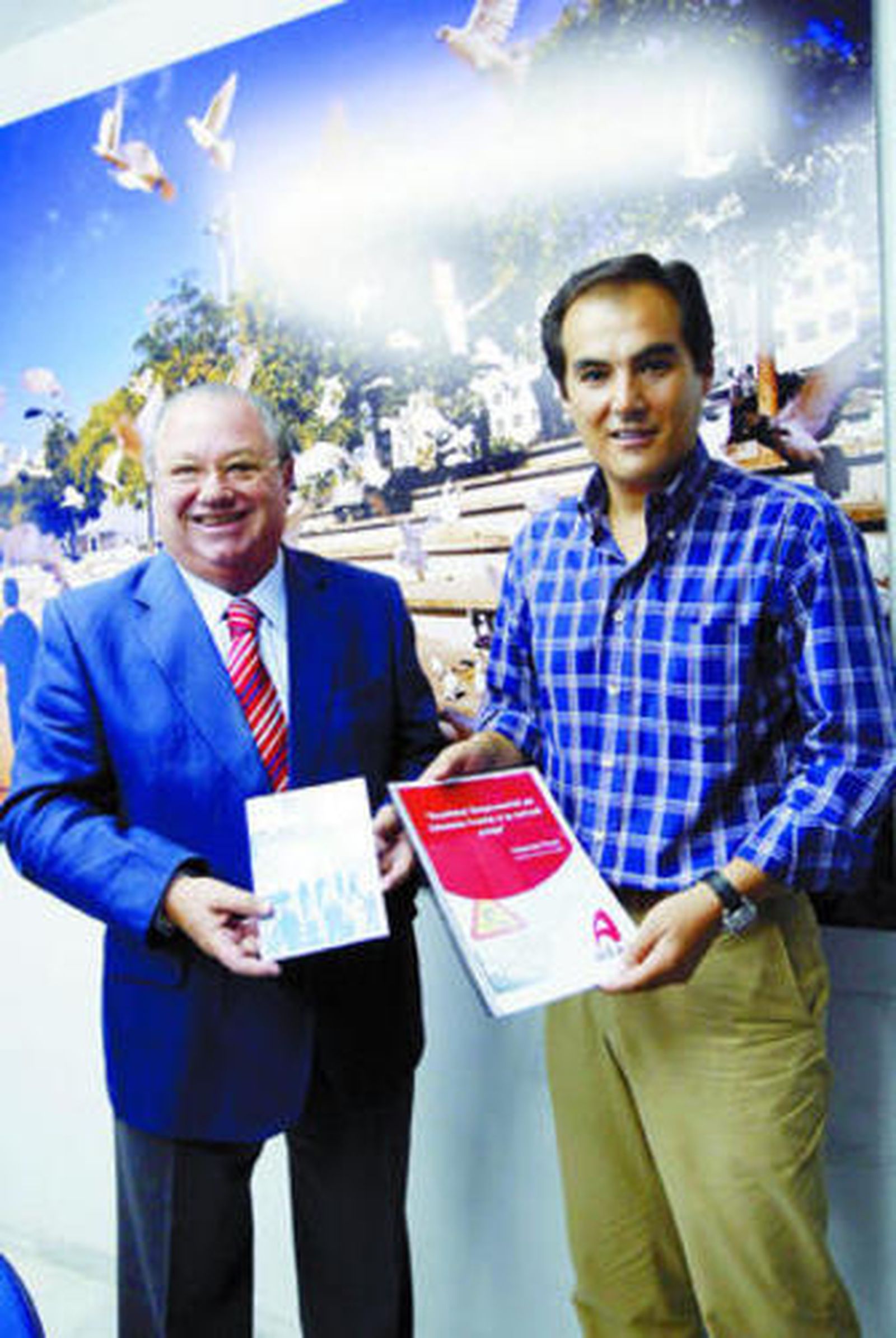 Miguel Ángel Tamarit y José Antonio Nieto, en la sede del PP.