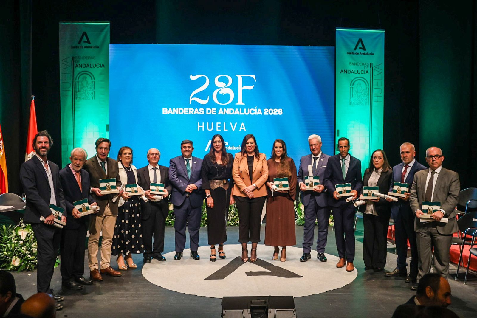 Fotografías del acto de entrega de las Banderas de Andalucía en la provincia de Huelva con motivo del 28F