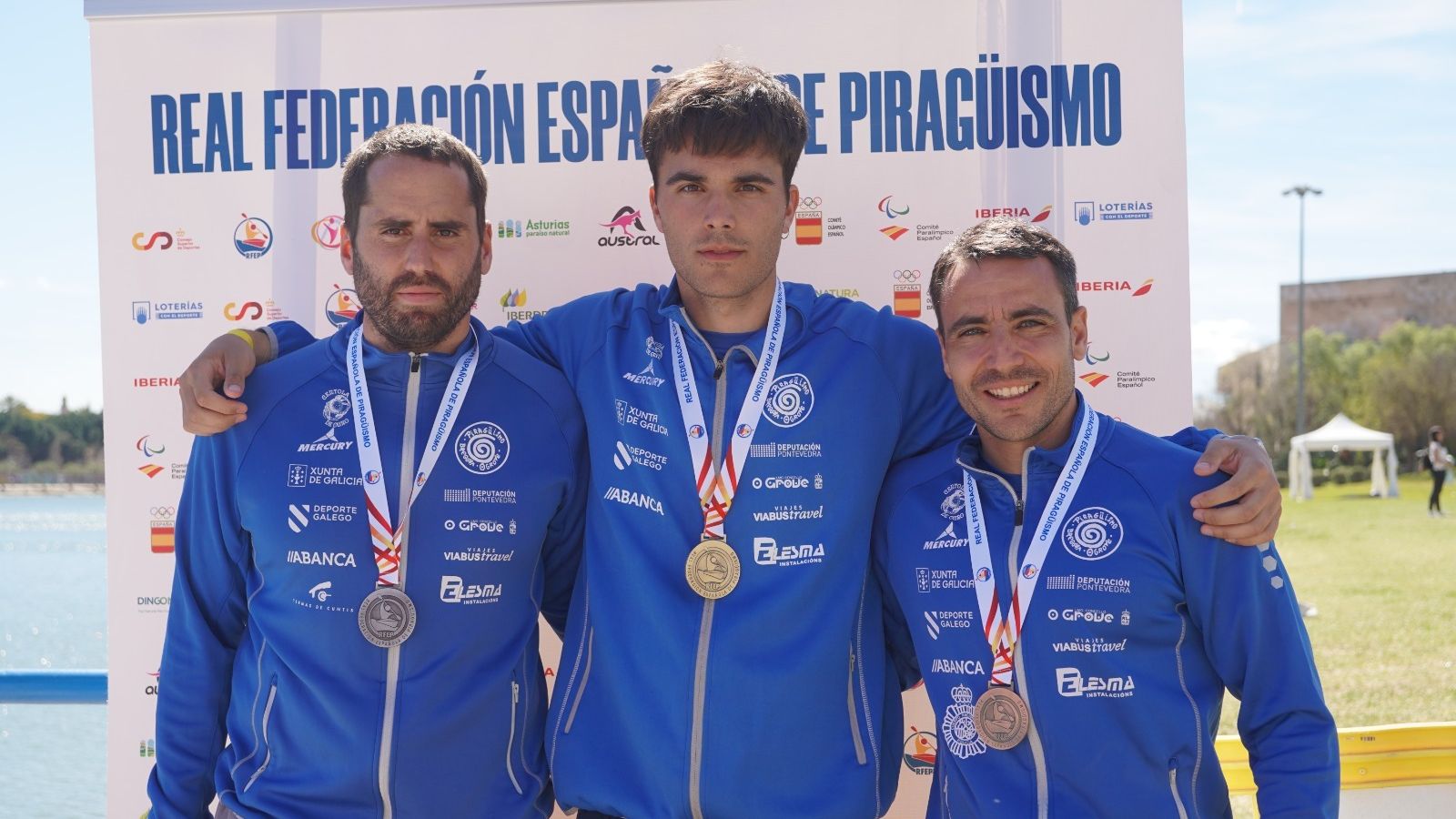 Podio del C1 masculino con Domínguez, Romero y Campos.