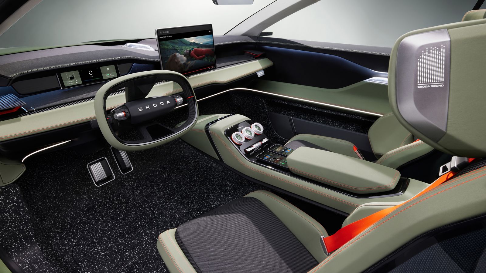 Al pulsar un botón, la instrumentación y el volante ocupan menos espacio y los asientos delanteros se reposicionan para que todos los pasajeros puedan ver cómodamente la pantalla central.