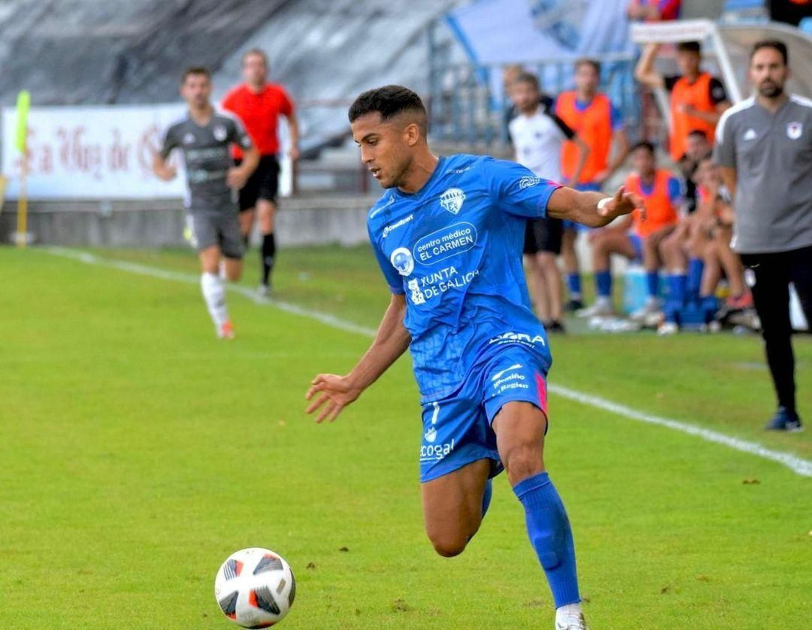 Amin, en un partido. Amin, en un partido.